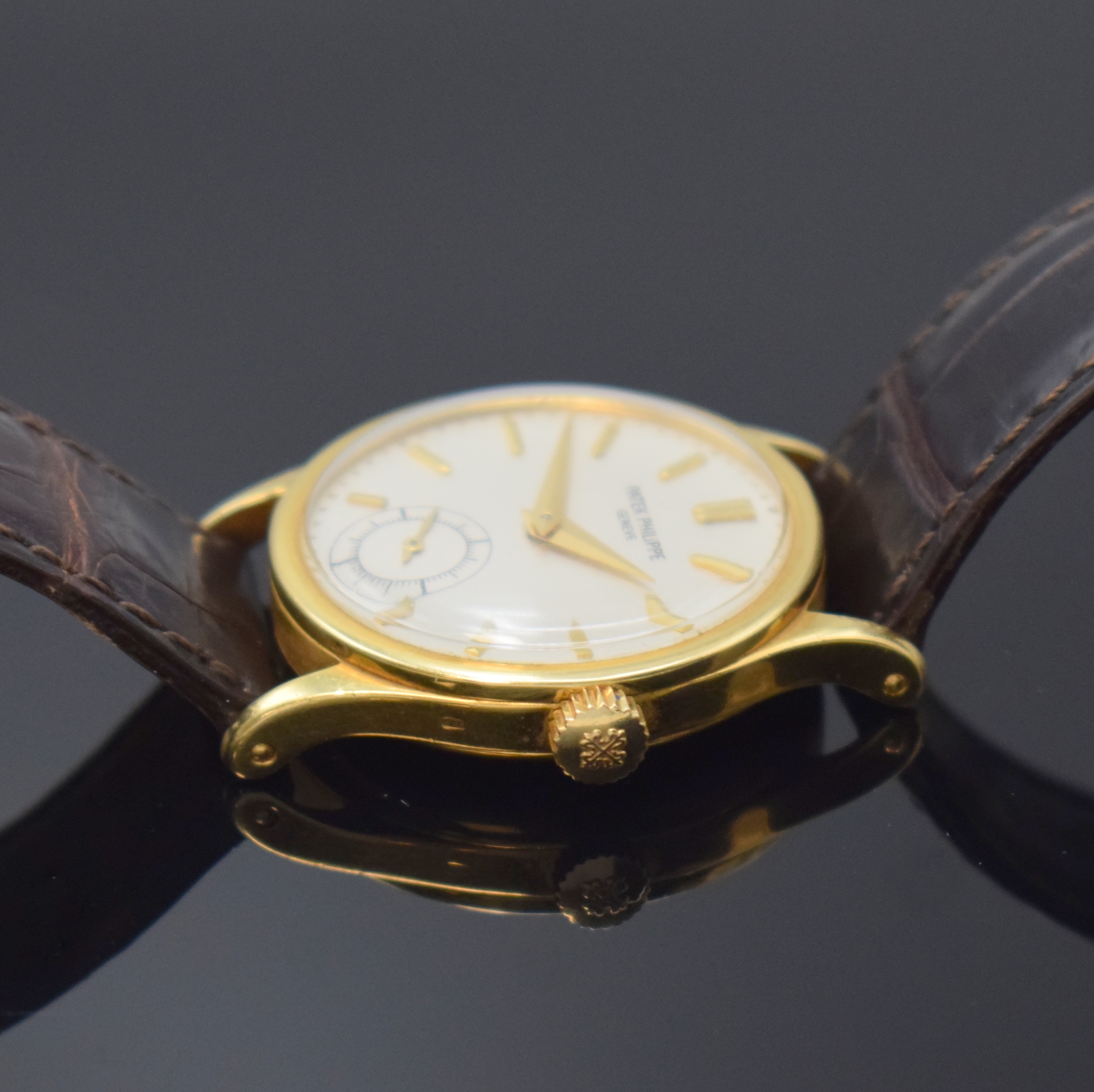 Detail c: PATEK PHILIPPE feine und seltene Armbanduhr Calatrava Referenz 96, Schweiz um 1947, Handaufzug, 3 teil. GG 750/000 Geh. inkl. PPC Lederband m. PPC GG ...