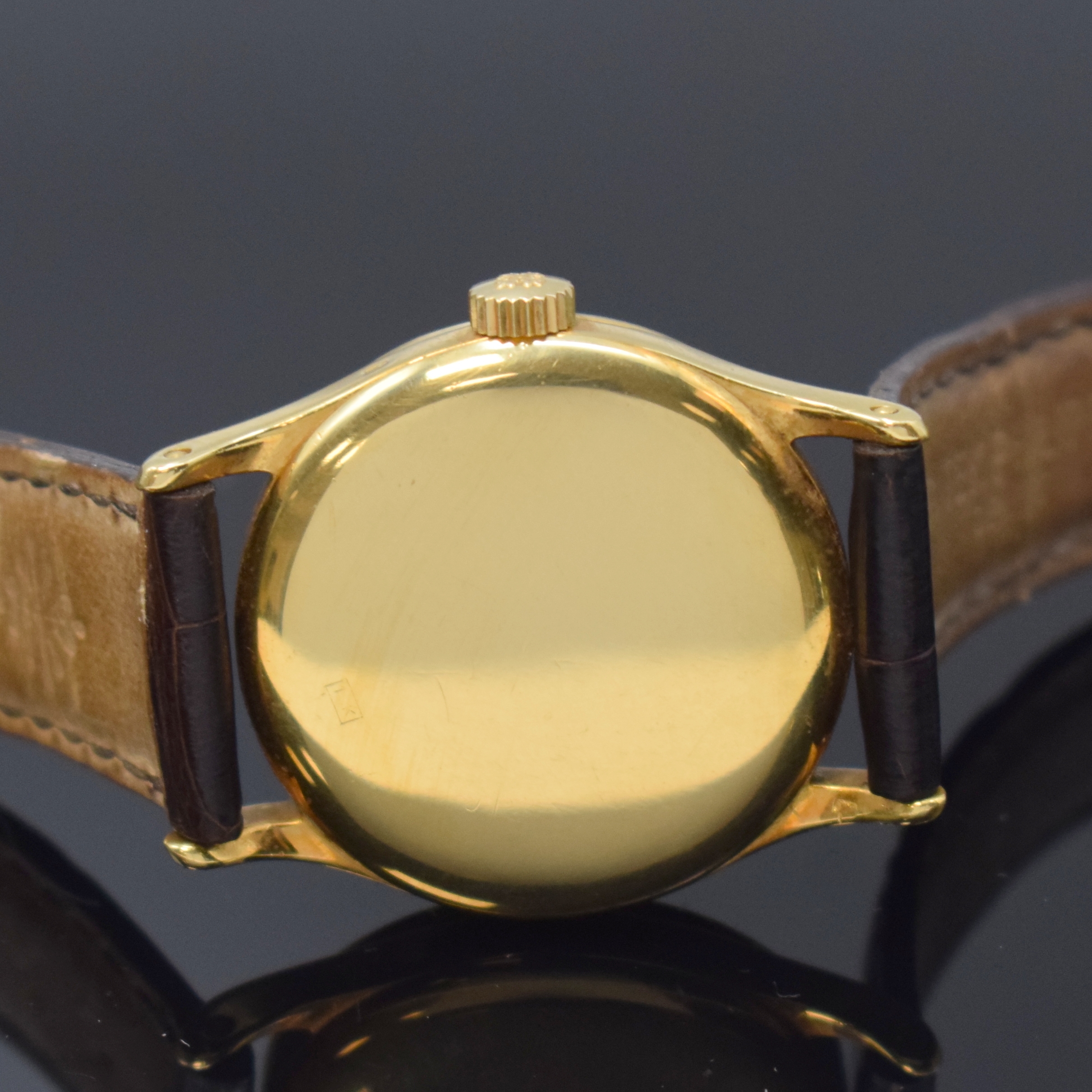 Detail e: PATEK PHILIPPE feine und seltene Armbanduhr Calatrava Referenz 96, Schweiz um 1947, Handaufzug, 3 teil. GG 750/000 Geh. inkl. PPC Lederband m. PPC GG ...