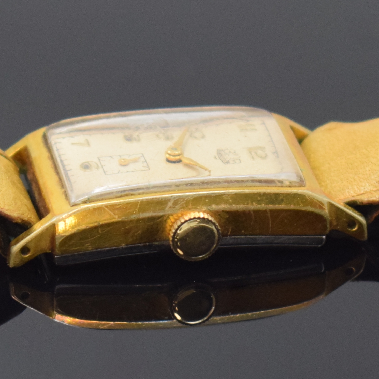 Detail b: GUB Herrenarmbanduhr Kaliber 62, Deutschland um 1955, Handaufzug, verg. Geh. ber., Edelstahlboden aufgedr., silb. Zifferbl. fl., arab. Zahlen, gold. ...