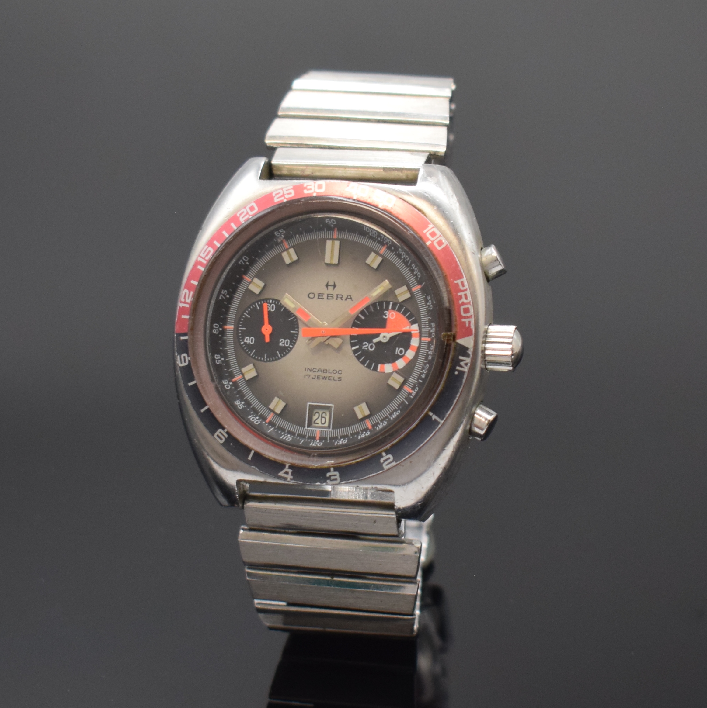 OEBRA Herrenchronograph mit Tiefenmesser in Stahl, Schweiz um 1975, Handaufzug, neutr. Stahlband m. Faltschl., Boden u. Krone verschr., Lünette m. ...
