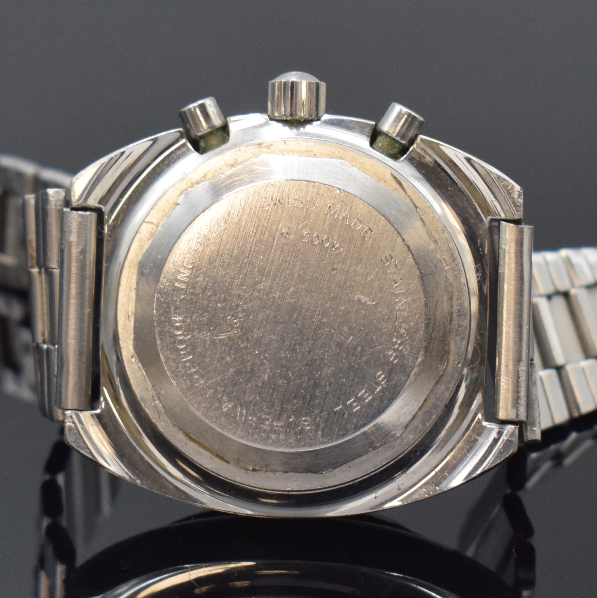 Detail c: OEBRA Herrenchronograph mit Tiefenmesser in Stahl, Schweiz um 1975, Handaufzug, neutr. Stahlband m. Faltschl., Boden u. Krone verschr., Lünette m. ...