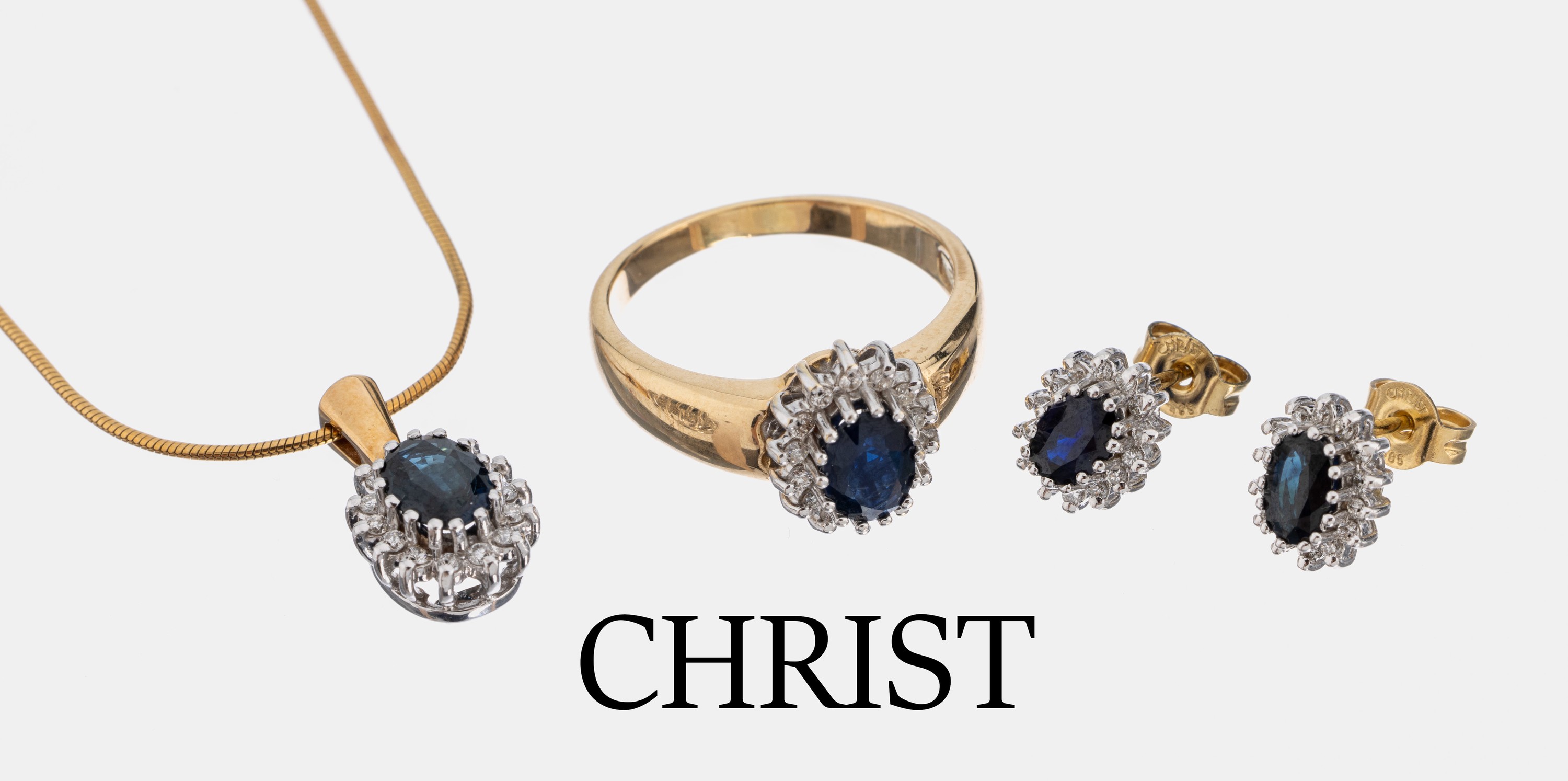 14 kt Gold CHRIST Saphir-Brillant-Schmuckset, GG/WG 585/000, best. aus: 1 Ring, RW 59, 1 Paar Ohrstecker, und 1 Anhänger, an Kette, GG 585/000, L. ...