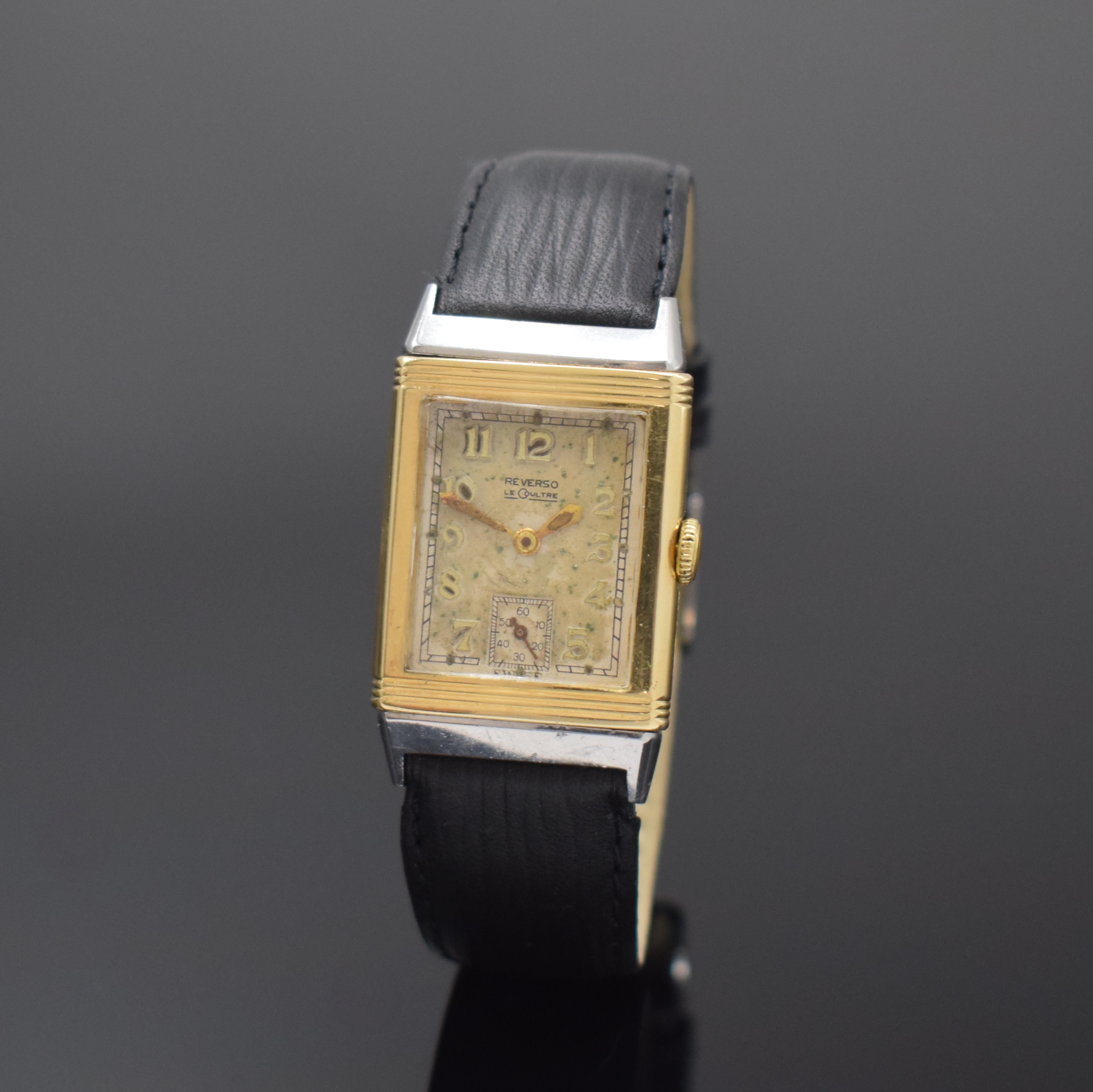 LeCoultre frühe Reverso Herrenarmbanduhr in Stahl und GG 585/000 kombiniert, Schweiz um 1938, um 180 Grad drehb. Geh., Rückseitige Gravur von 1938, ...