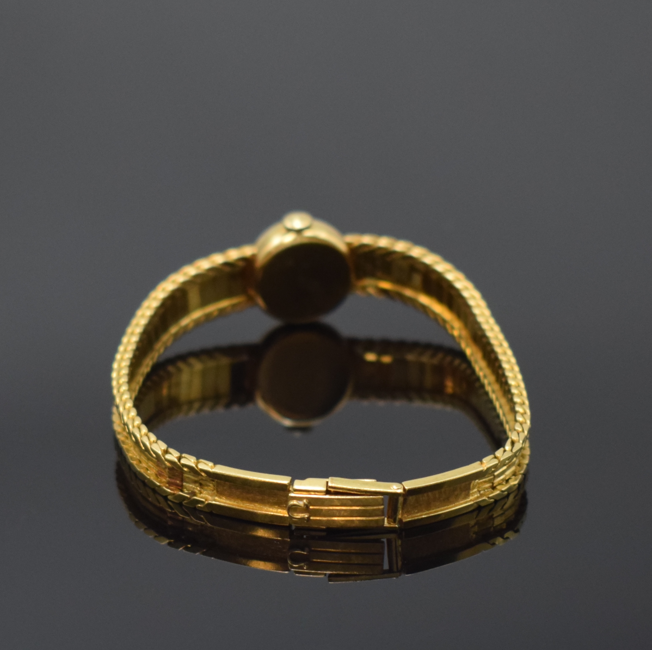 Detail b: OMEGA Damenarmbanduhr in GG 750/000 Referenz 7088 GY, Handaufzug, Schweiz um 1961, 2- teil. Geh., Boden aufgedr., orig. Band zum Ende verlängert, ...