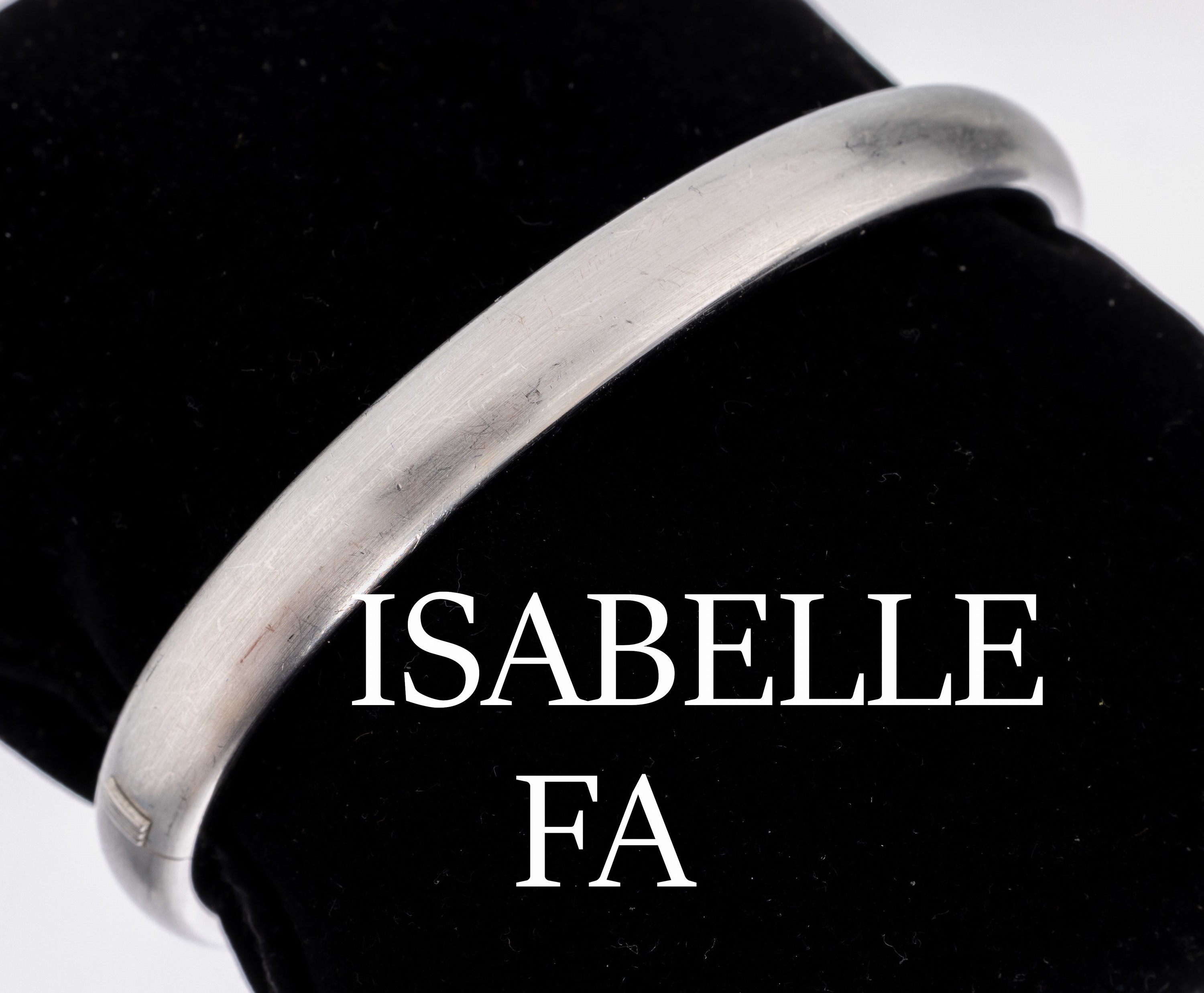 18 kt Gold ISABELLE FA Armreif, WG 750/000 sat., schwere massive Verarbeitung, ca. 6 x 5.2 cm, Kastenschloss, Klappscharnier, ca. 42.9 g, mit orig. ...