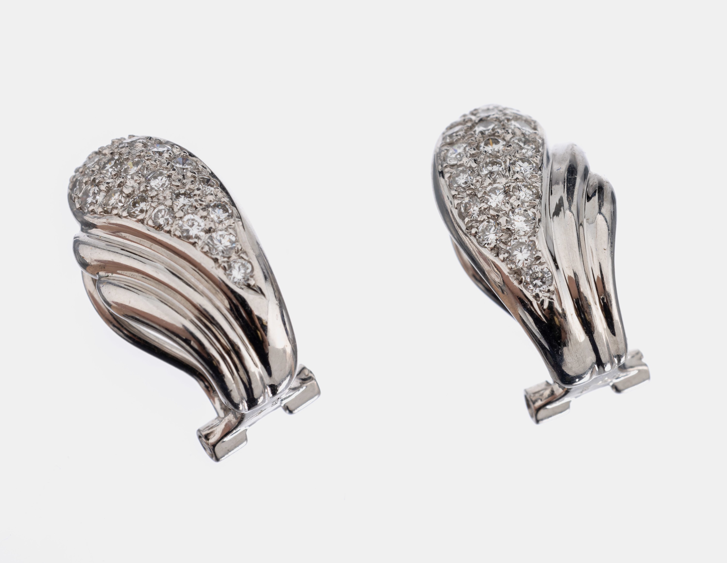 Paar 18 kt Gold Brillant-Ohrclips, WG 750/000, Brillanten zus. ca. 0.80 ct feines Weiß-Weiß/vs-si, ca. 7.1 g
