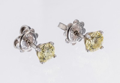 Image 26884321 - Paar 18 kt Gold Brillant-Ohrstecker, WG 750/000, 2 Brillanten zus. ca. 1.02 ct Gelb/si