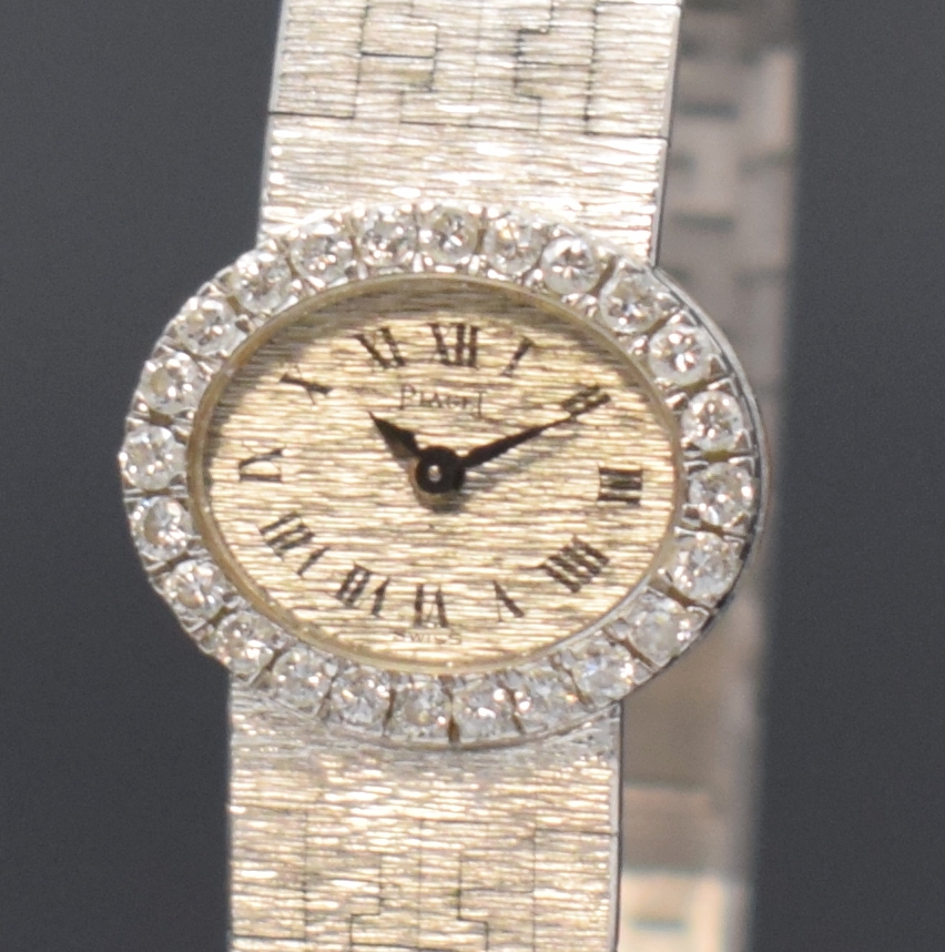 Detail a: PIAGET Backwinder Damenarmbanduhr in WG 750/000 mit Diamanten Referenz 3766 A 6, Schweiz um 1960, Handaufzug, orig. Goldband, Lünette aufw. m. ...