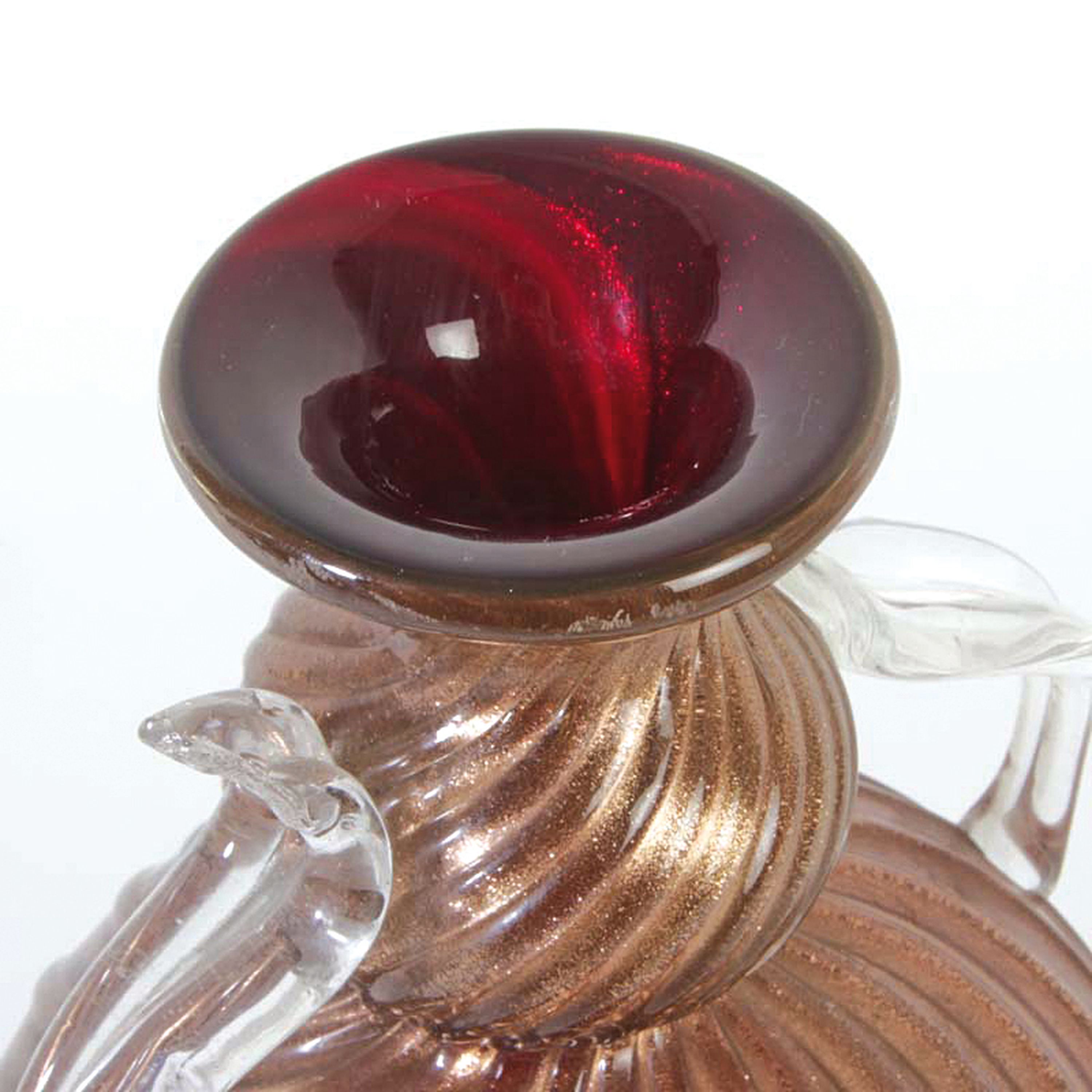 Detail c: Doppelhenkelvase, wohl Ercole Barovier, Murano, farbloses Glas mit sog. Aventurin- Einshcmelzung, in sich gedreht, H. ca. 28cm