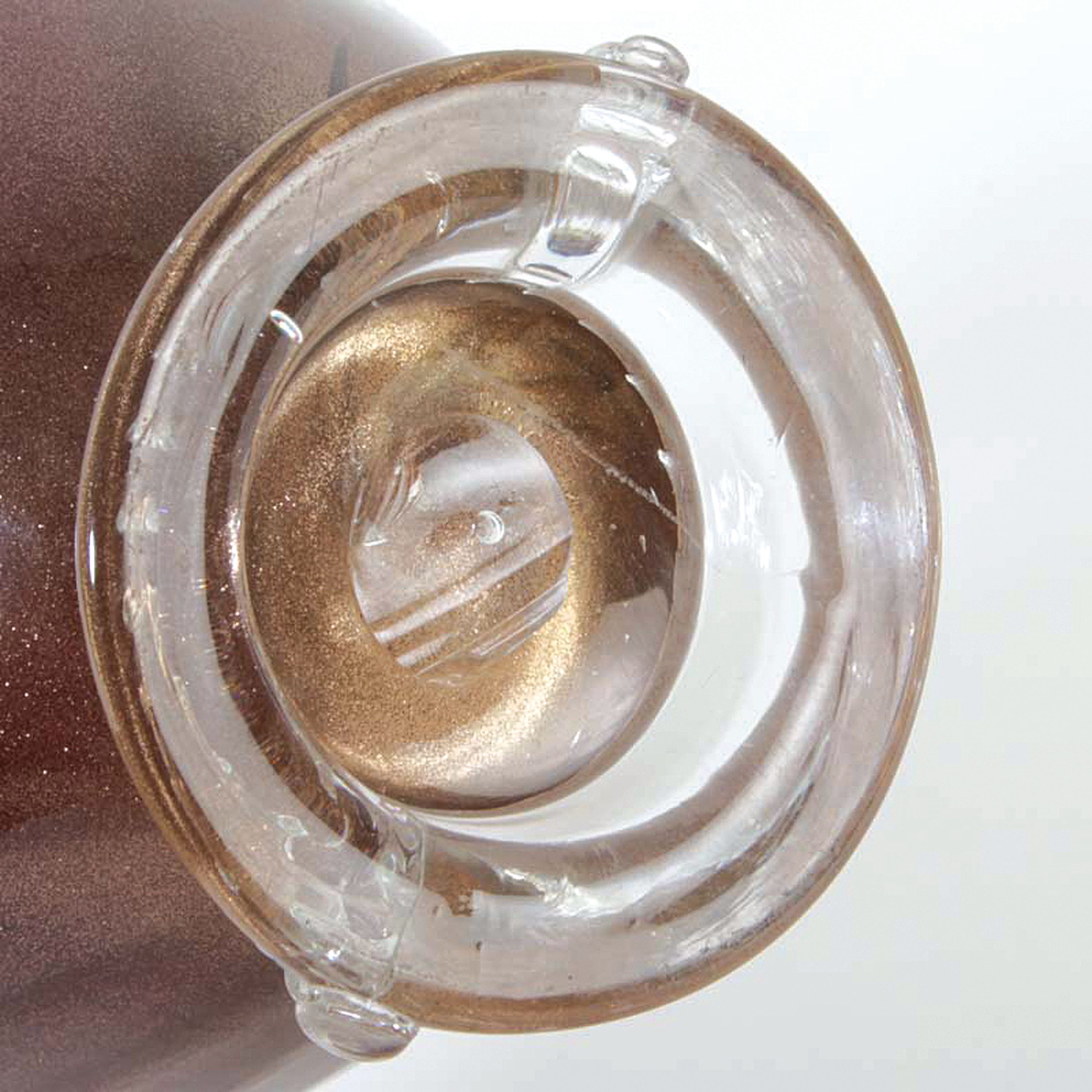 Detail h: Doppelhenkelvase, wohl Ercole Barovier, Murano, farbloses Glas mit sog. Aventurin- Einshcmelzung, in sich gedreht, H. ca. 28cm