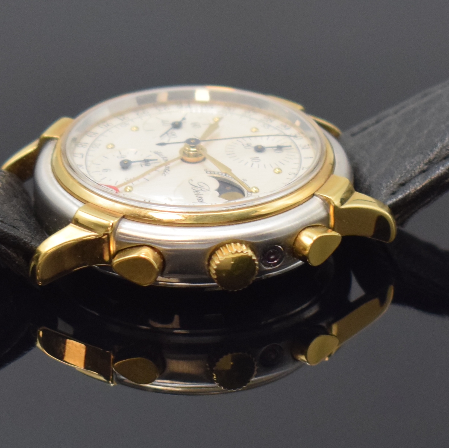 Detail b: BERNEY Armbandchronograph mit Datum und Mondphase, Schweiz um 1990, z. T. verg. Edelstahlgeh., Boden verschr., silb. Zifferbl. z. T. guill., ...