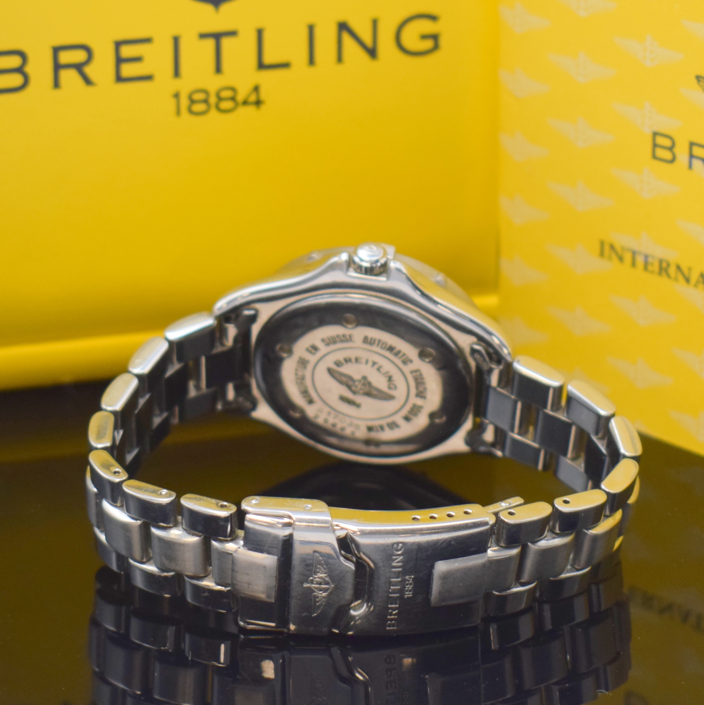 Detail b: BREITLING Colt Armbanduhr Referenz A17035 in Stahl, Schweiz um 1996, Automatik, Boden u. Krone verschr., Lünette m. 60er Teilung eins. drehb., orig. ...