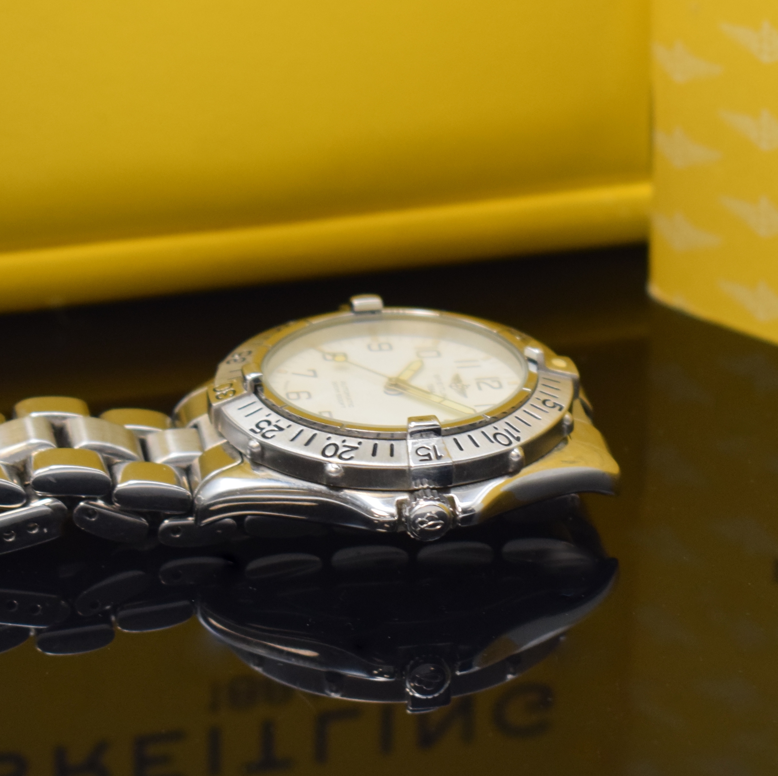 Detail c: BREITLING Colt Armbanduhr Referenz A17035 in Stahl, Schweiz um 1996, Automatik, Boden u. Krone verschr., Lünette m. 60er Teilung eins. drehb., orig. ...