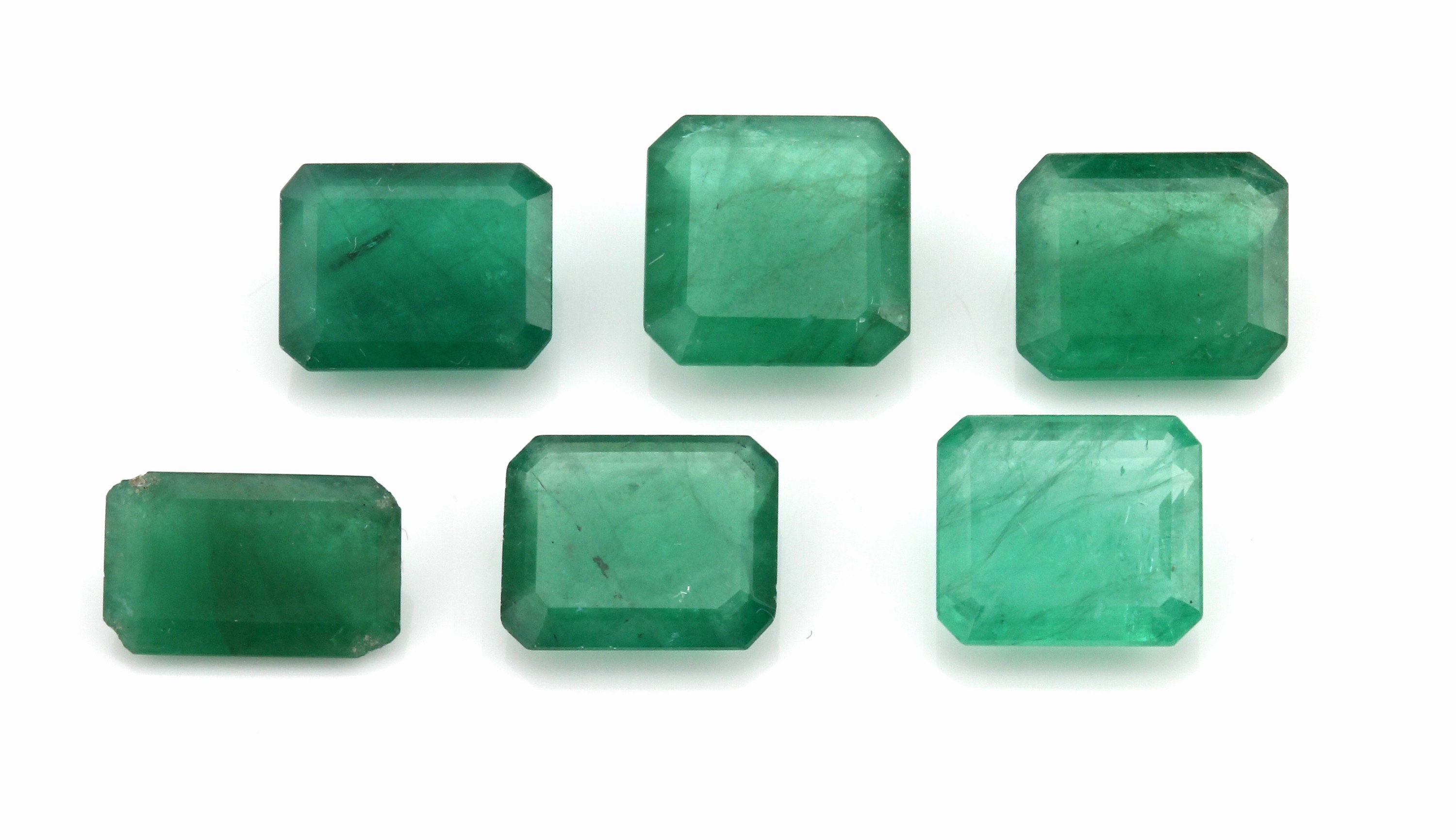 Lot 6 lose Smaragde, zus. ca. 15 ct, oktagonale Treppenschliffe in versch. Größen, Ausfassware