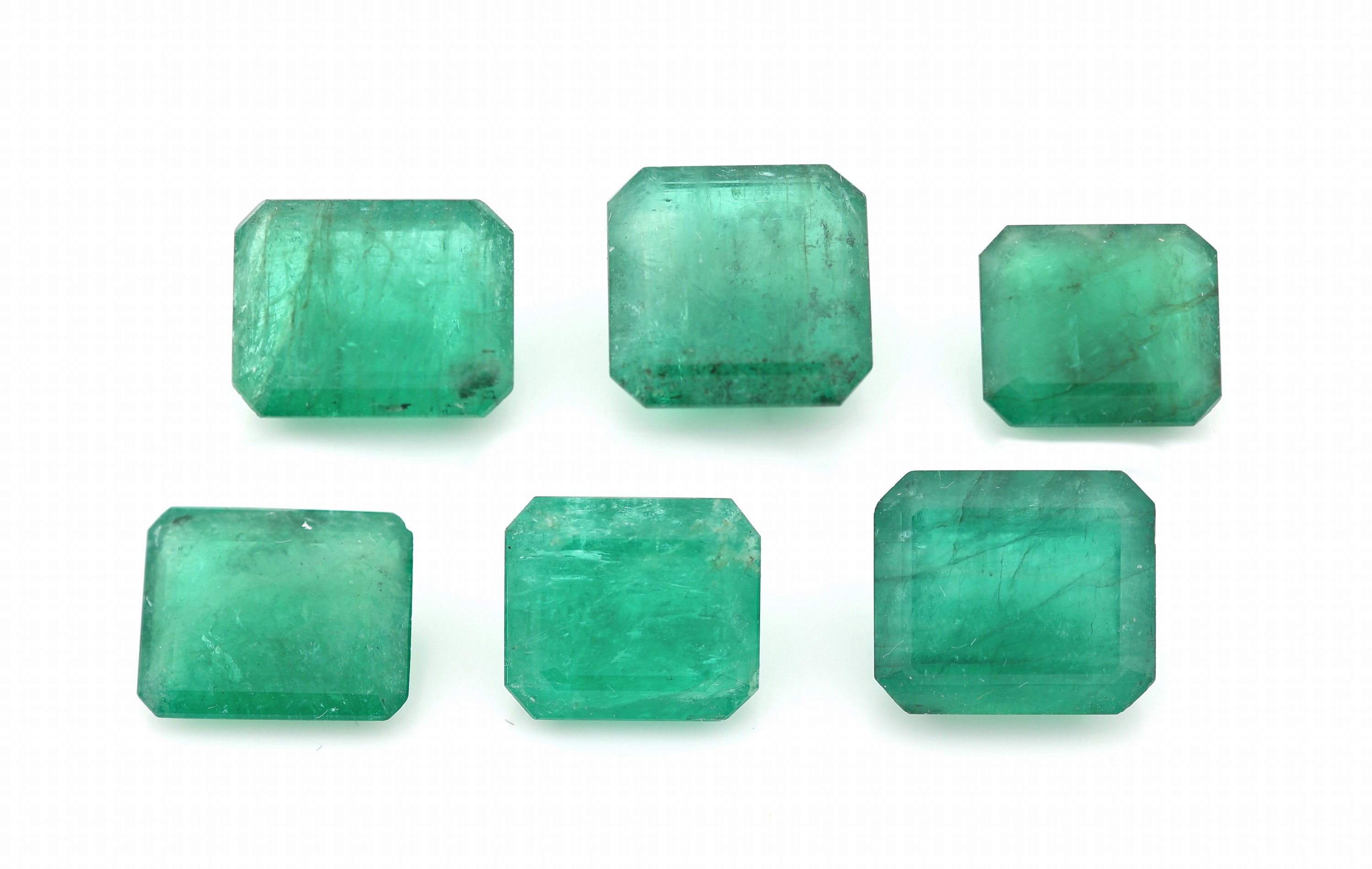 Lot 6 lose Smaragde, zus. ca. 19 ct, oktogonale Treppenschliffe in versch. Größen, Ausfassware