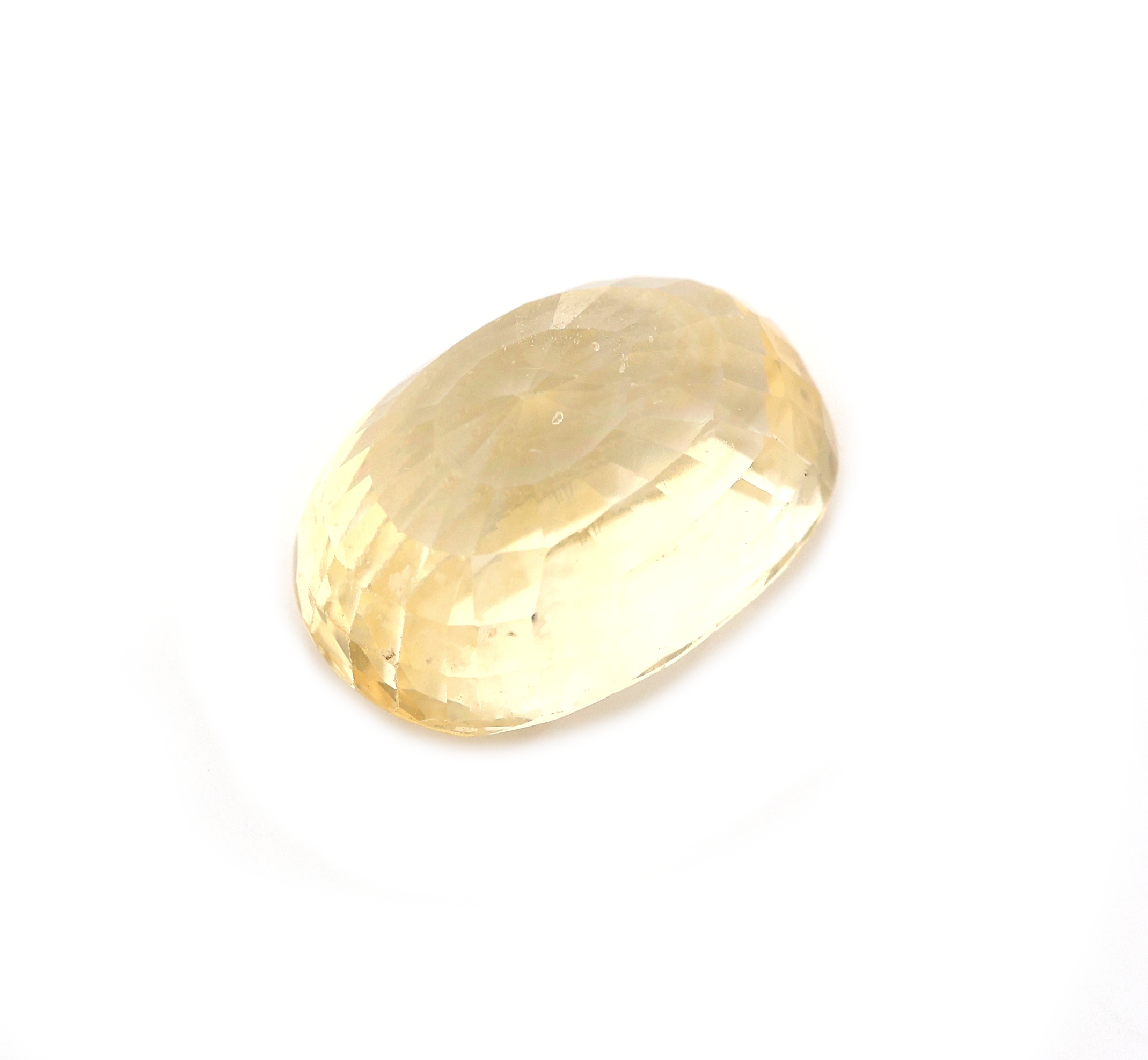 Detail a: Loser gelber Saphir, ca. 6.90 ct, ovalfacett.