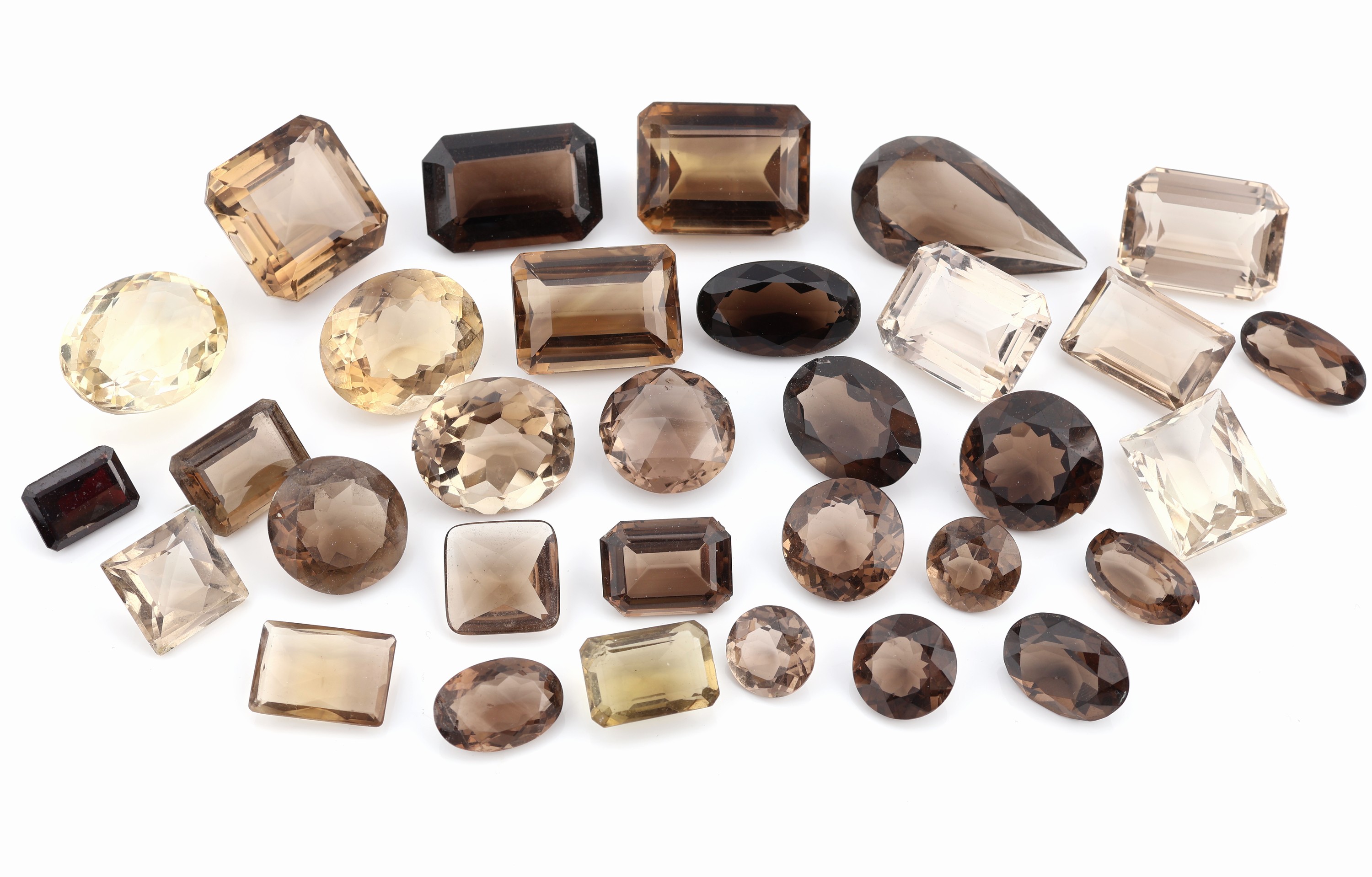 Lot lose Rauchquarze, zus. ca. 700 ct, versch.Schliffformen, Größen und Farbnuancen