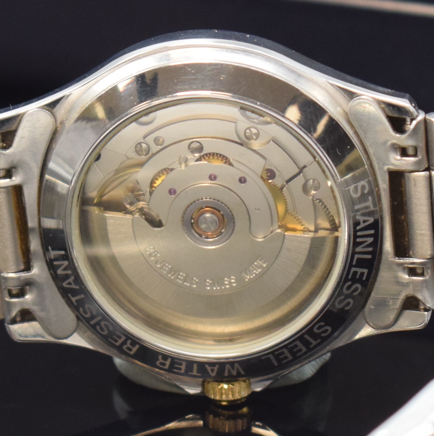Detail e: GUB Automatik Herrenarmbanduhr, eine der ersten Serien nach der Wende mit Basiskal. ETA 2824-2, z. T. verg. Edelstahlgeh. inkl. orig.Gliederband m. ...