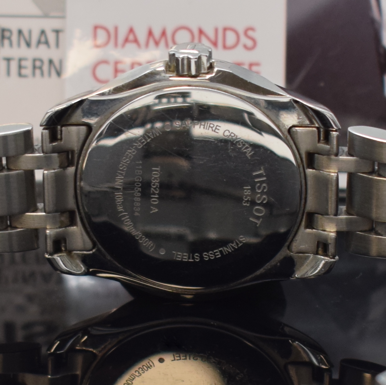 Detail d: TISSOT Damenarmbanduhr Couturier in Stahl mit Brillantlünette Referenz T035210, Schweiz verk. lt. beil. Garantie 06/2015, quarz, orig. Gliederband ...
