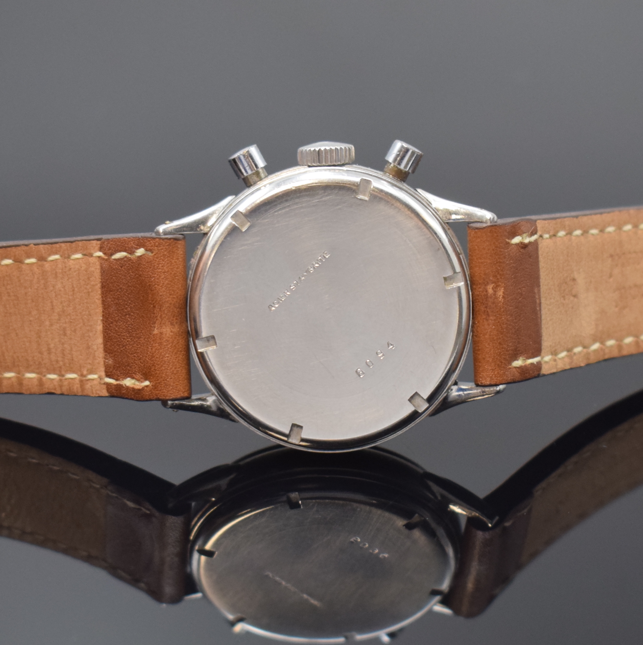 Detail c: CORTEBERT verschraubter Schaltradchronograph in Stahl, Schweiz um 1950, Handaufzug, 2- tlg. Geh., ausgefallene Bandanstöße, silb. Zifferbl. rest., ...