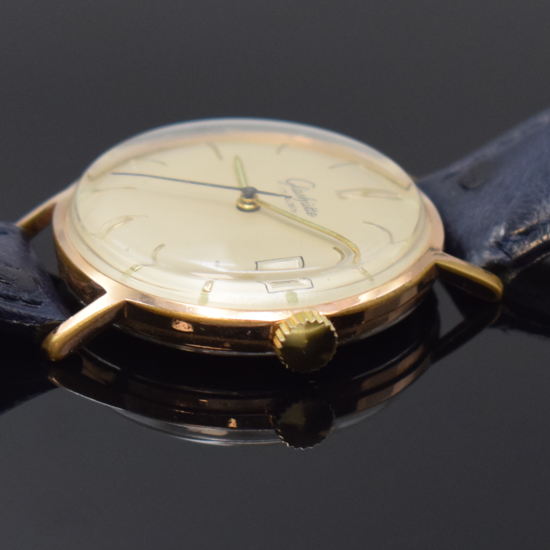 Detail b: GLASHÜTTE Kaliber 69.1 vergoldete Armbanduhr, DDR um 1965, Handaufzug, 2-tlg. Geh., Stahlboden aufgedr., silb. Zifferbl. pat., gold. Indizes u. ...