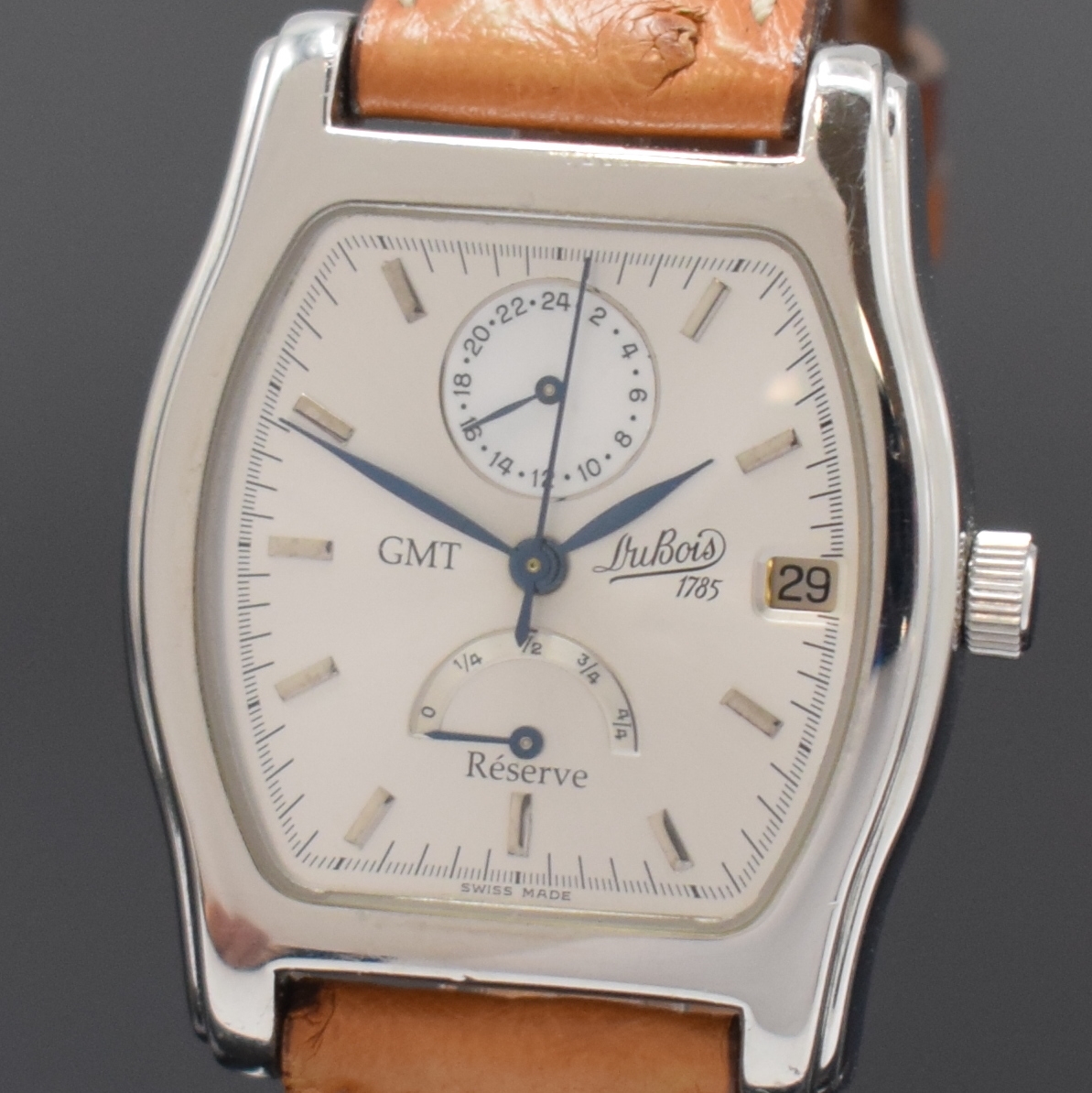 Detail a: DUBOIS GMT tonneauförmige Armbanduhr mit Gangreserveanzeige in Stahl, Schweiz um 2000, Automatik, beids. vergl. Geh., Boden 4- fach verschr., silb. ...