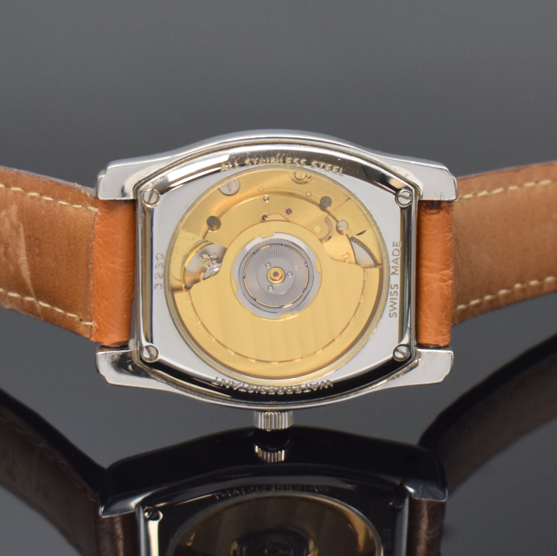 Detail d: DUBOIS GMT tonneauförmige Armbanduhr mit Gangreserveanzeige in Stahl, Schweiz um 2000, Automatik, beids. vergl. Geh., Boden 4- fach verschr., silb. ...