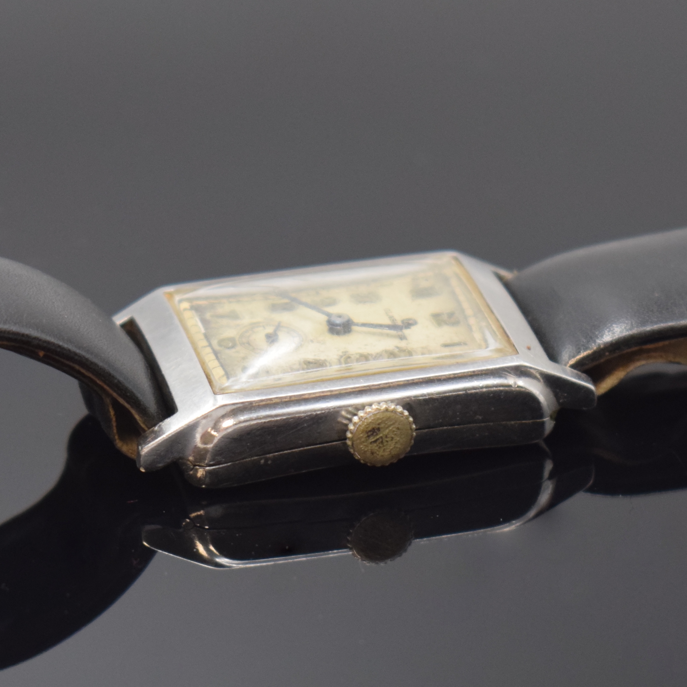 Detail b: TUTIMA GLASHÜTTE Armbanduhr mit Kaliber Urofa 58 in Stahl, Deutschland um 1935, Handaufzug, rechteckig. Geh., Scharnierboden, silb. Zifferbl. ...
