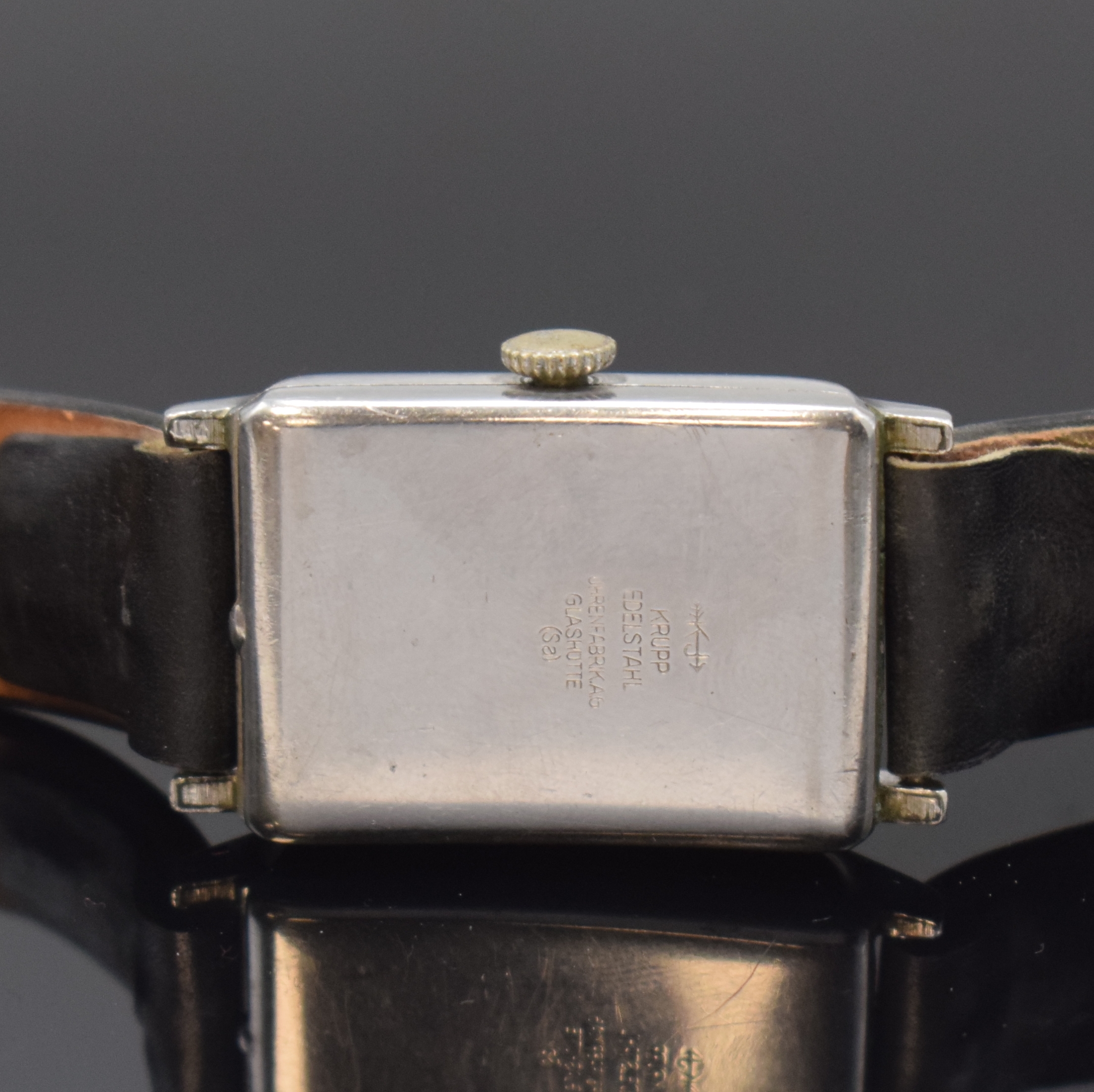 Detail c: TUTIMA GLASHÜTTE Armbanduhr mit Kaliber Urofa 58 in Stahl, Deutschland um 1935, Handaufzug, rechteckig. Geh., Scharnierboden, silb. Zifferbl. ...