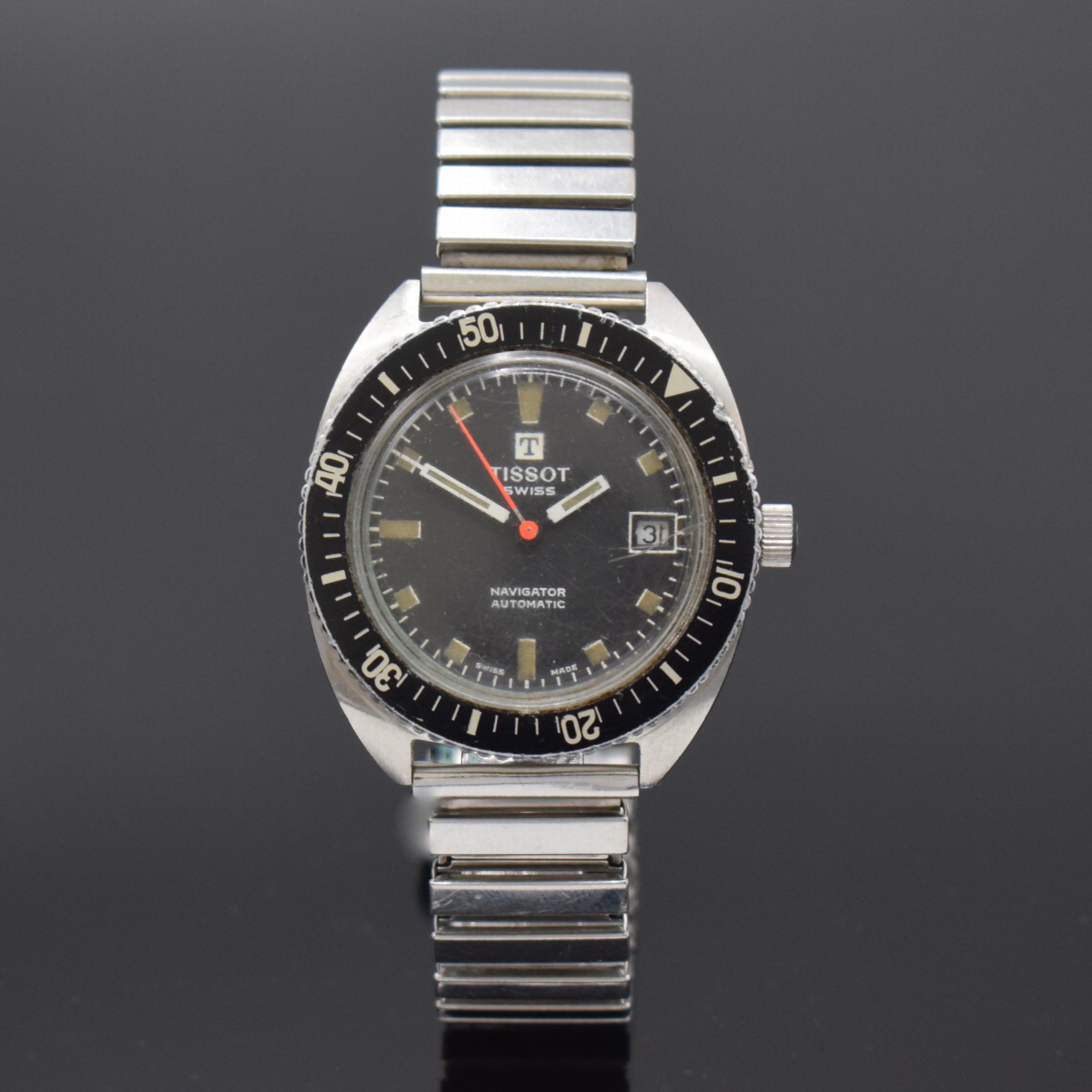 TISSOT Navigator Herrenarmbanduhr in Stahl, Schweiz um 1970, Automatik, Boden geschr., neutr. Flexband, Lünette m. 60er Teilung eins. drehb., ...