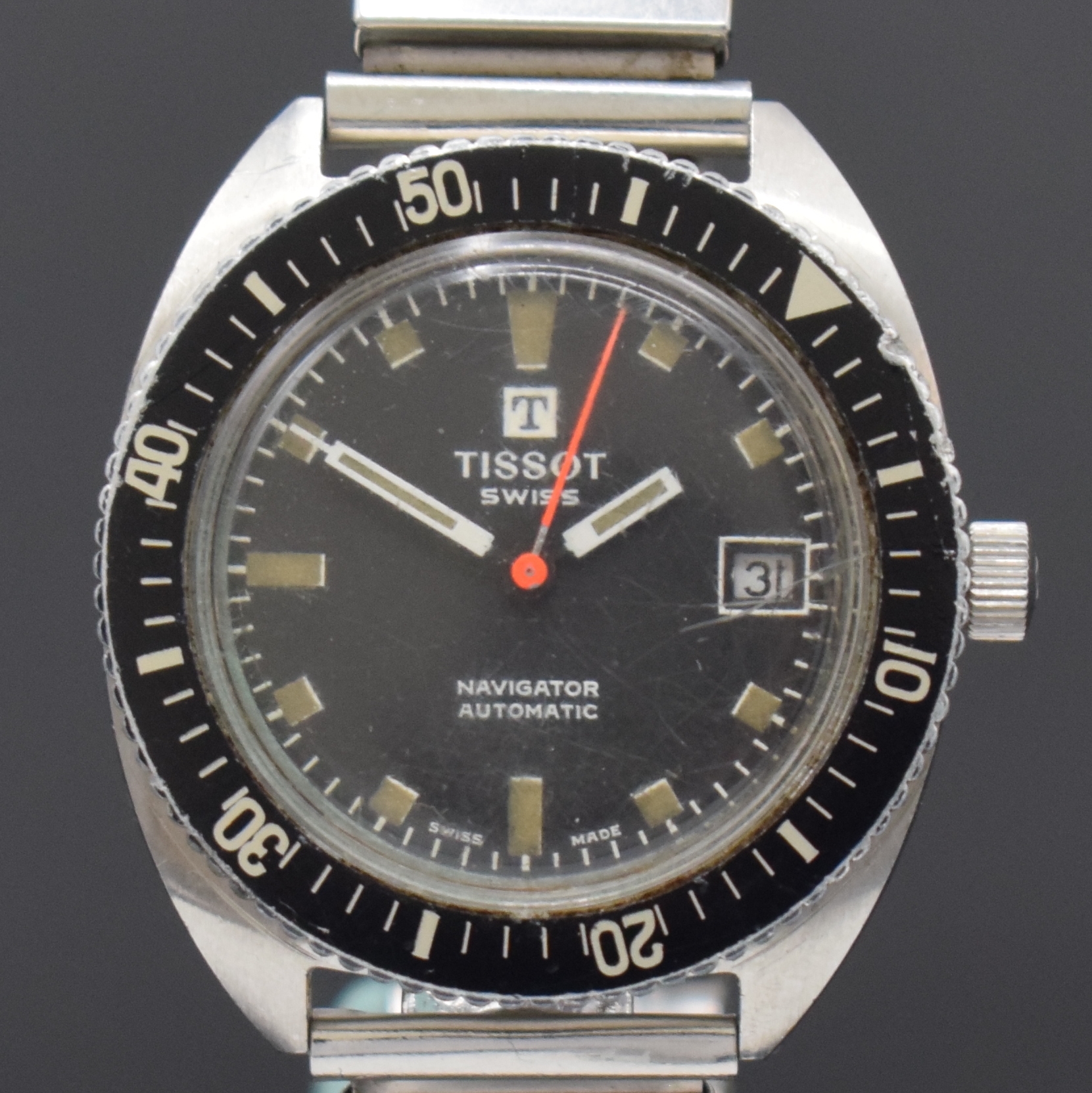 Detail a: TISSOT Navigator Herrenarmbanduhr in Stahl, Schweiz um 1970, Automatik, Boden geschr., neutr. Flexband, Lünette m. 60er Teilung eins. drehb., ...