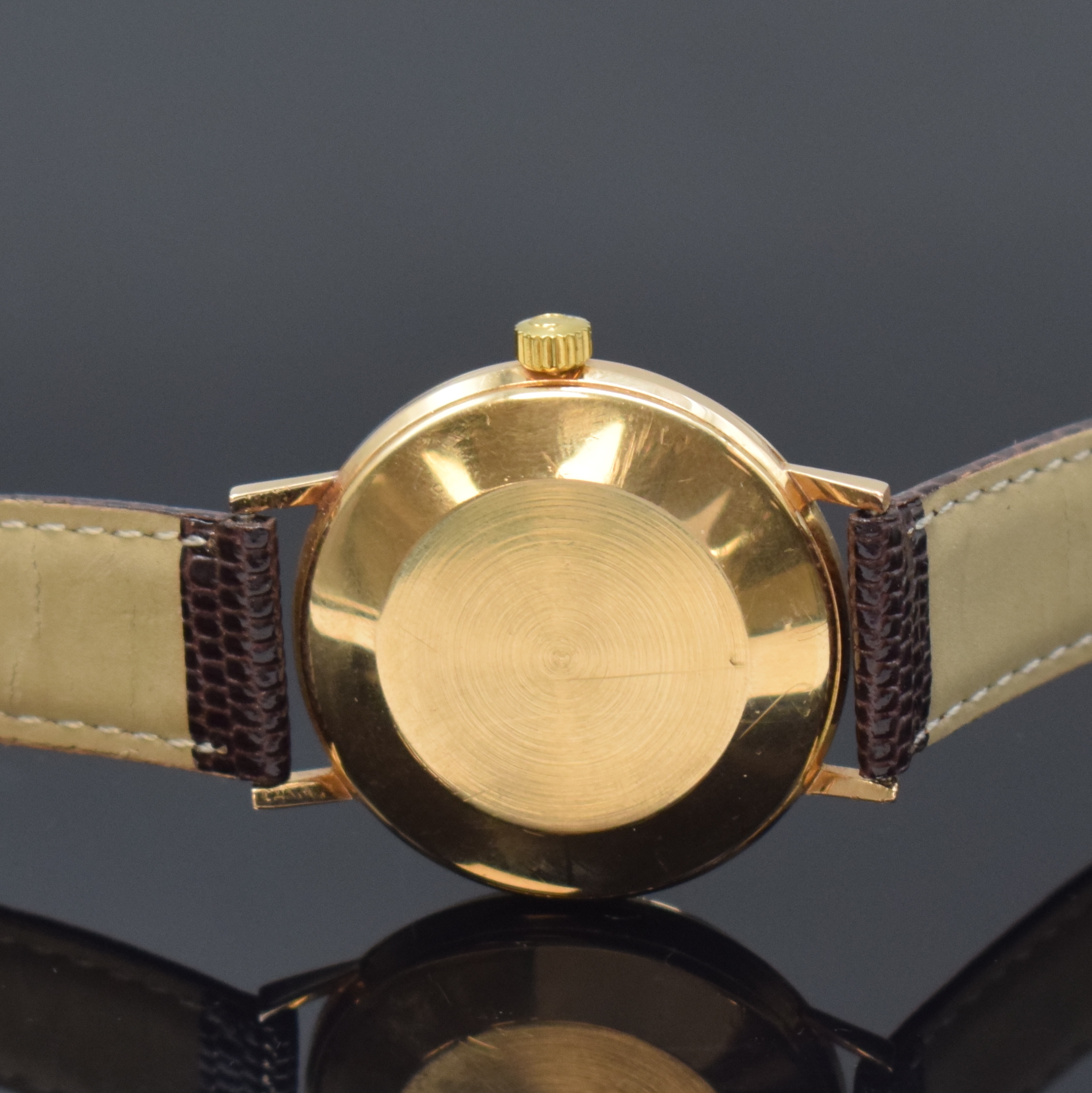 Detail c: OMEGA Armbanduhr im neutralen Gehäuse in RG 750/000, Schweiz um 1969, Automatik, Boden u. Glasrand aufgedr., silb. Zifferbl. m. aufges. Ind., gold. ...