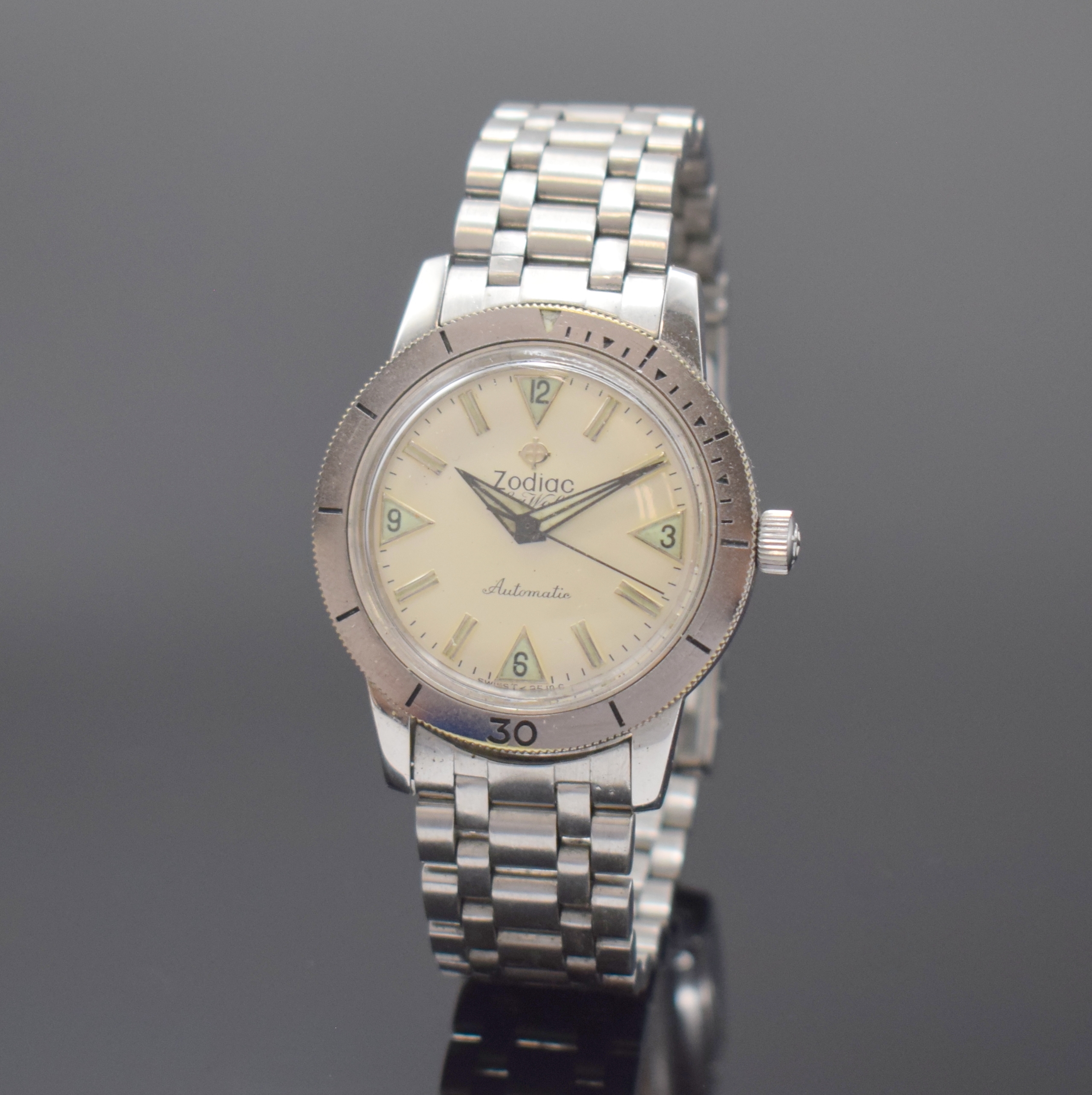 ZODIAC Herrenarmbanduhr Sea Wolf, Schweiz um 1967, Edelstahlgeh., Boden aufgedr., orig. Gliederband m. Faltschl. (JB Champion USA), Lünette m. 60er ...