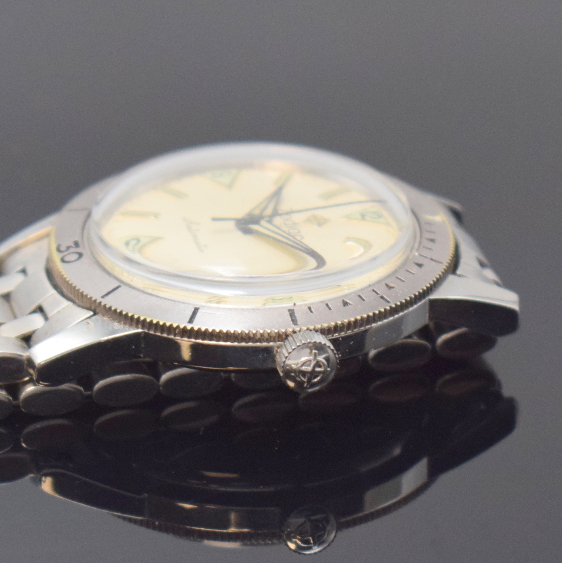 Detail c: ZODIAC Herrenarmbanduhr Sea Wolf, Schweiz um 1967, Edelstahlgeh., Boden aufgedr., orig. Gliederband m. Faltschl. (JB Champion USA), Lünette m. 60er ...