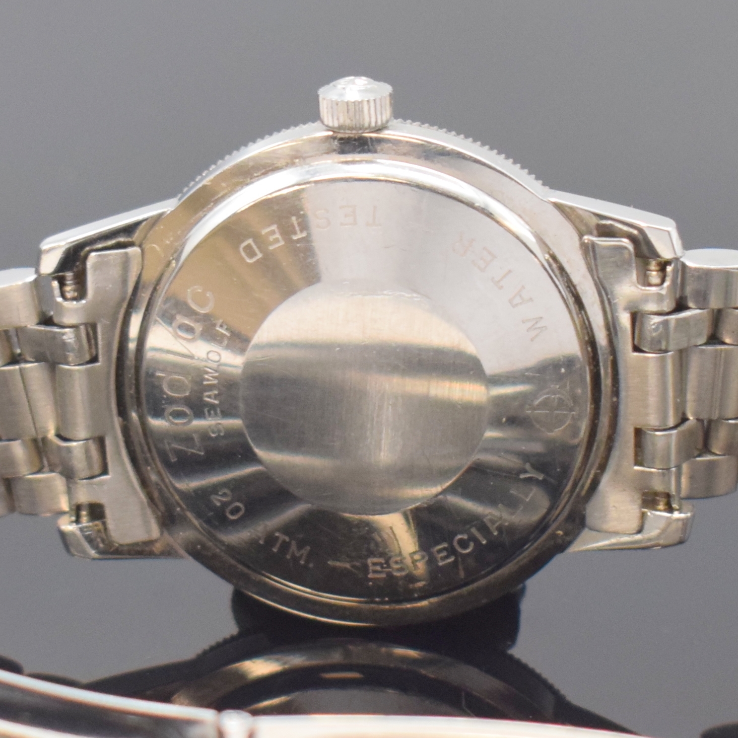 Detail d: ZODIAC Herrenarmbanduhr Sea Wolf, Schweiz um 1967, Edelstahlgeh., Boden aufgedr., orig. Gliederband m. Faltschl. (JB Champion USA), Lünette m. 60er ...