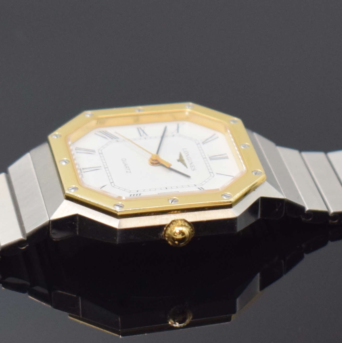 Detail c: LONGINES Armbanduhr Referenz 4842 950, Schweiz um 1980, quarz, octagonale, z. T. verg. Edelstahlgeh. inkl. Gliederband, Boden aufgedr., emailfarb. ...