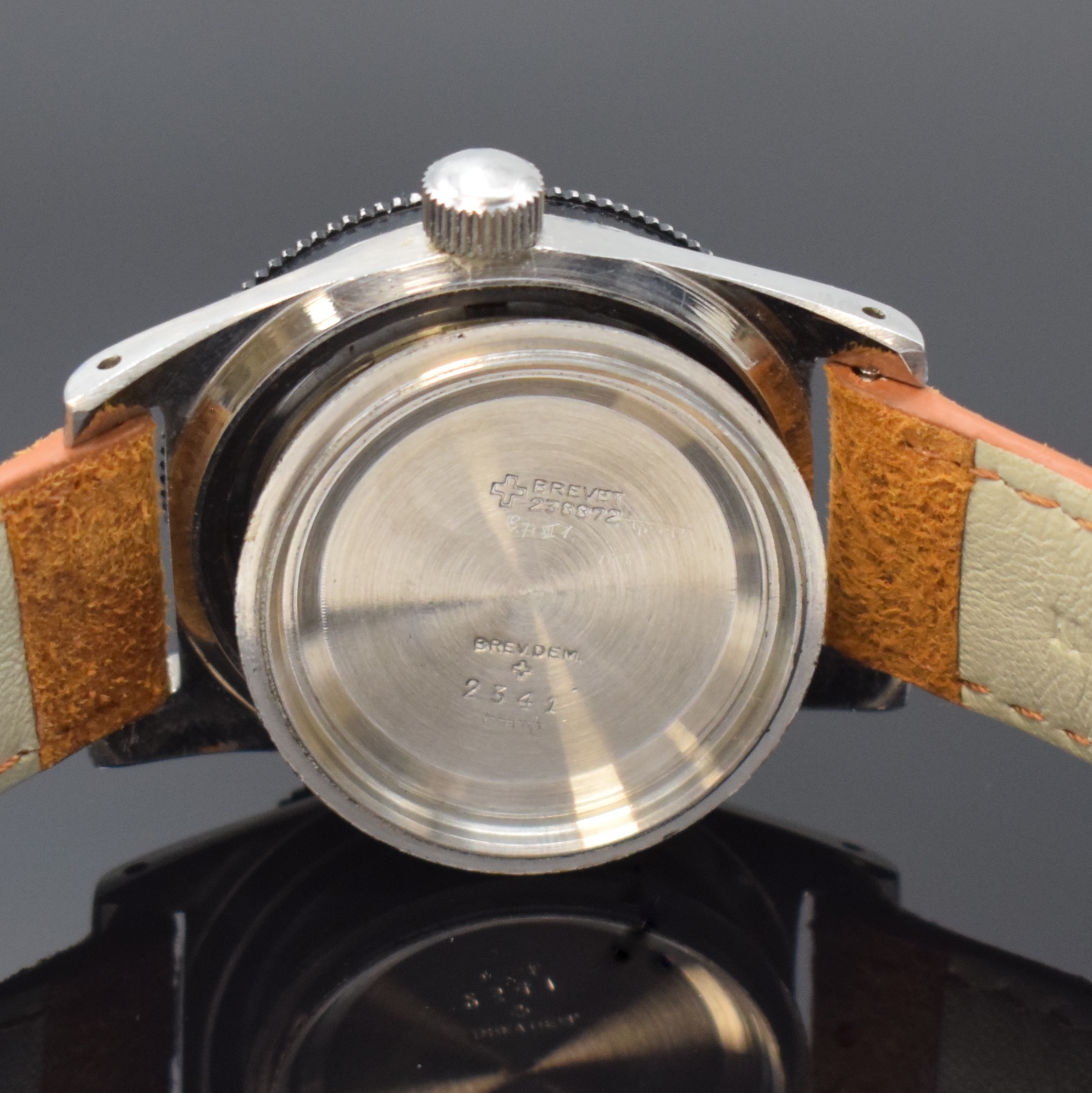 Detail f: DANIEL PERRET Herrenarmbanduhr, Schweiz um 1960, Automatik, Edelstahlgeh., Boden und Krone verschr., beids. drehb. Lünette m. 60er Teilung, ...