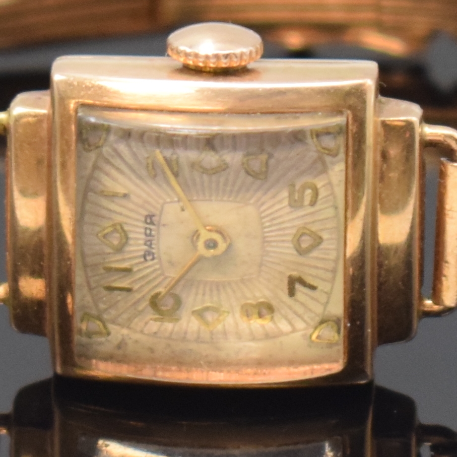 Detail a: Damenarmbanduhr in RG 583/000, Handaufzug, für den russischen Markt, Gliederband mit Kastenschloß und Sicherheitsacht, Boden aufgedr., vers. ...
