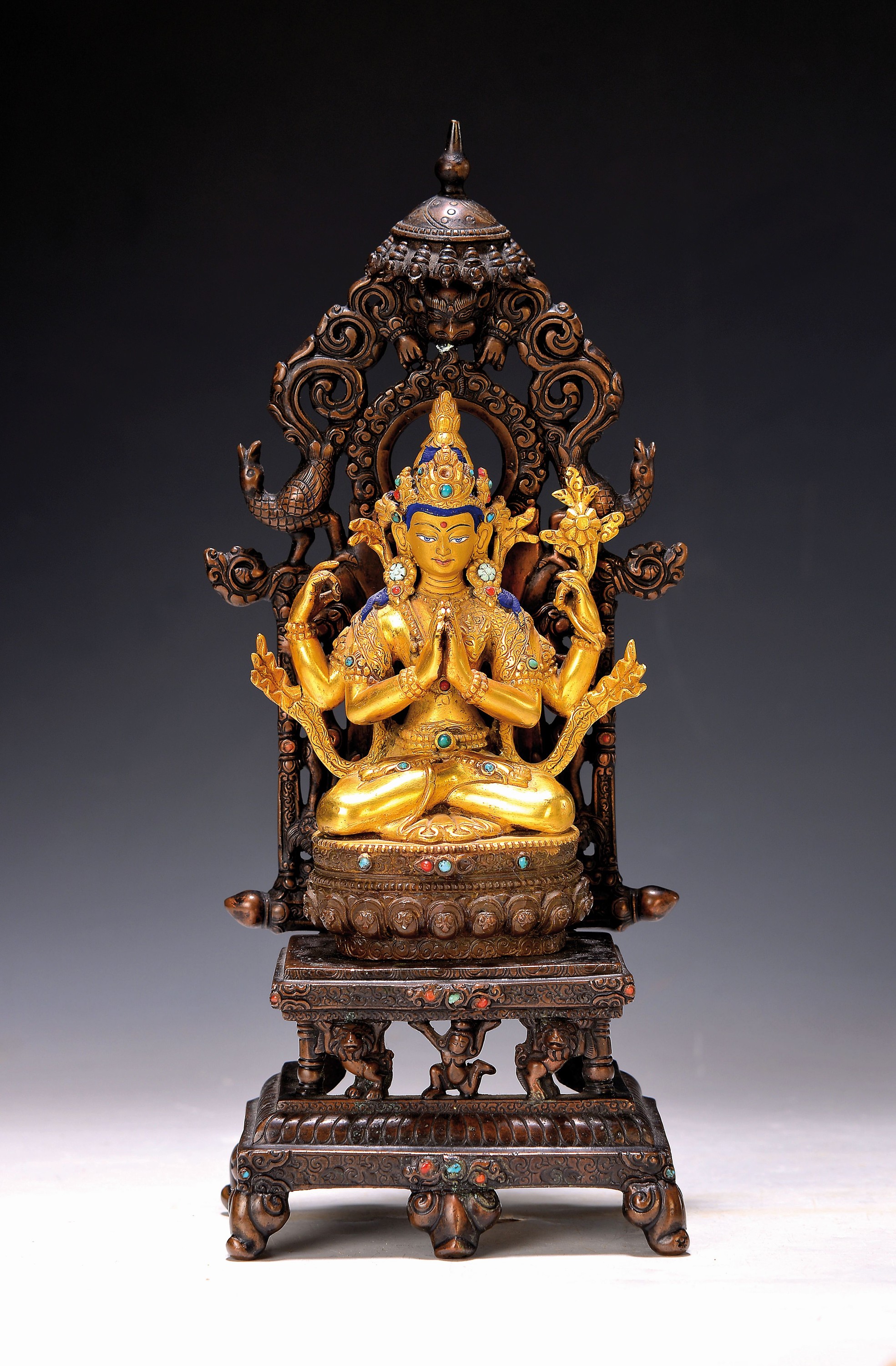 Avalokiteshvara ( Shadakshari-Lokeshvara) Nepal, 20. Jh., Bronze, Kopf und Haare bemalt,z.T. vergoldet, mit Halbedelsteinen besetzt, ca. 28 x 11.5 x ...