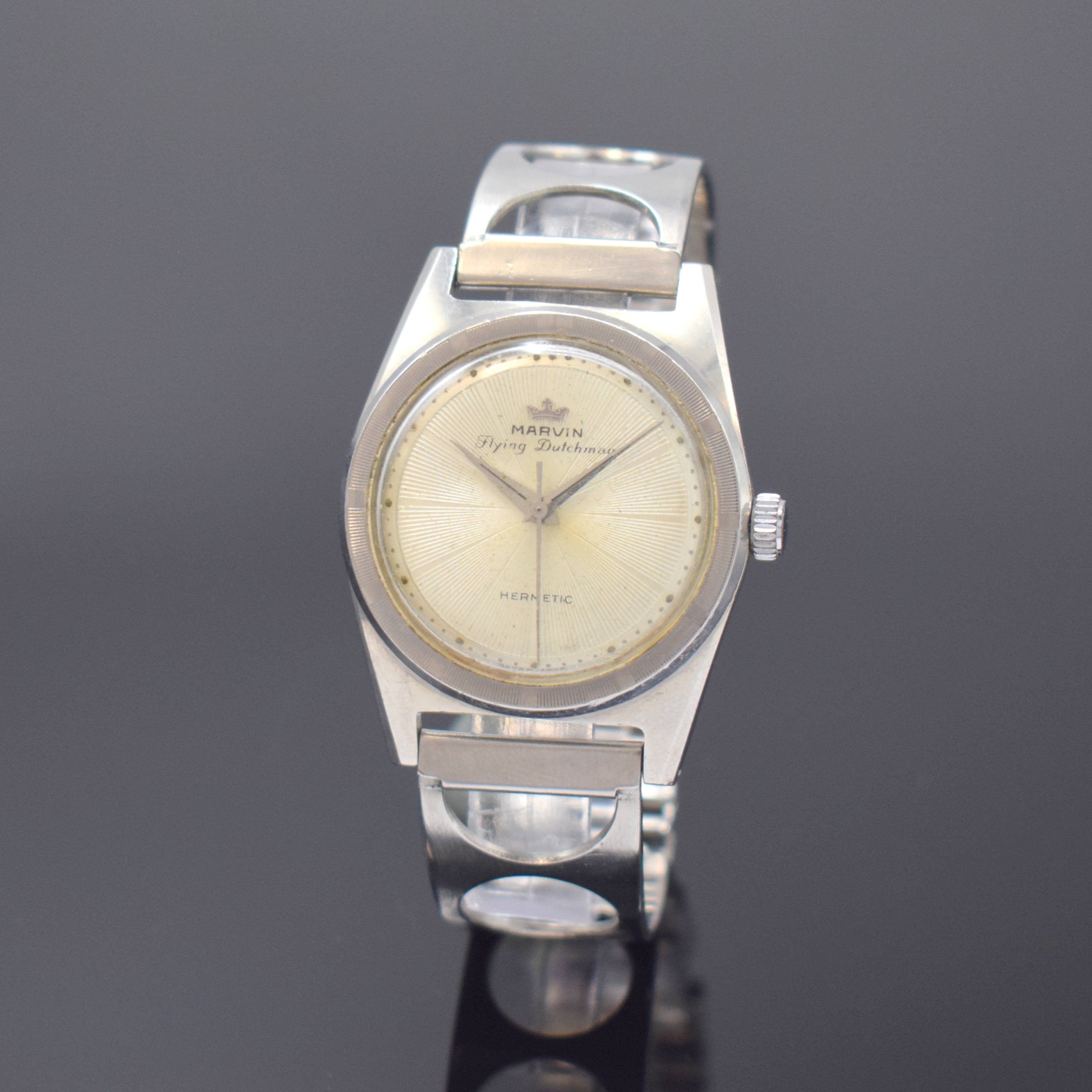 MARVIN Flying Dutchman Hermetic Herrenarmbanduhr, Handaufzug, Schweiz um 1950, Edelstahlgeh. inkl. neutr. Gliederband, Boden verschr., Indexlünette, ...