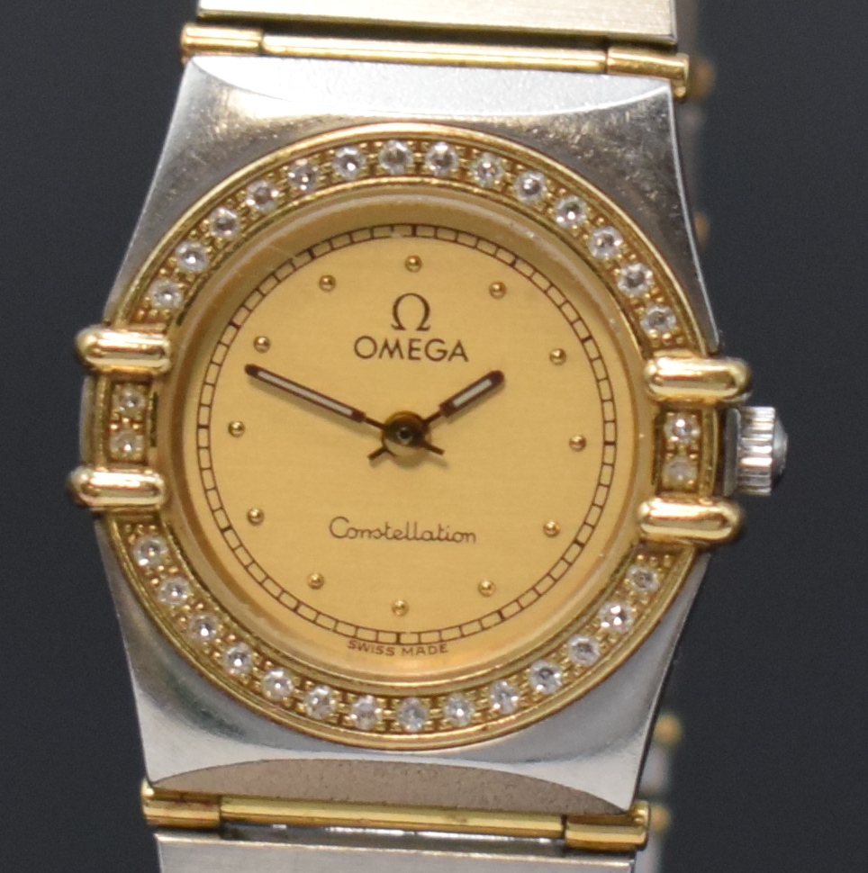 Detail a: OMEGA Constellation Damenarmbanduhr Referenz 895.1080.1, Schweiz um 1995, Edelstahl/Gold kombiniert inkl. Gliederband m. Faltschl., Lünette aufw. m. ...