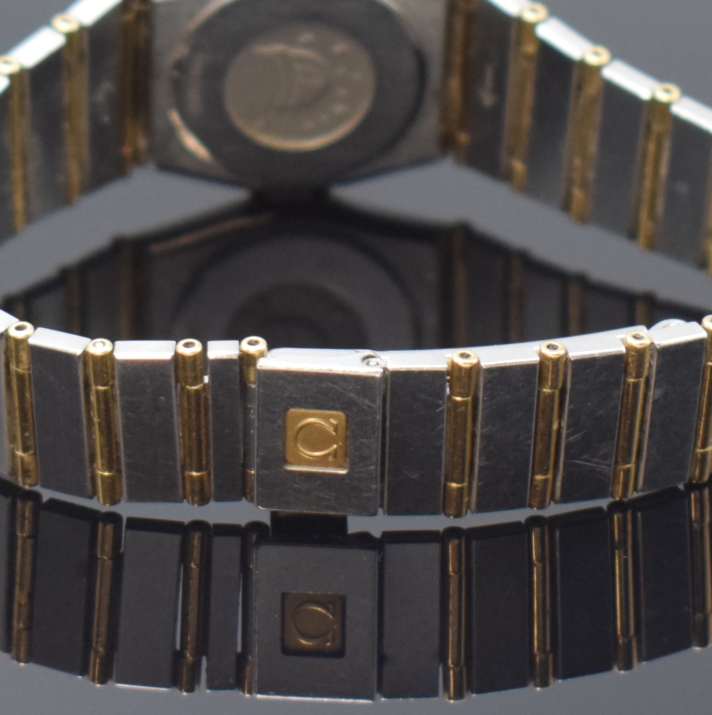 Detail b: OMEGA Constellation Damenarmbanduhr Referenz 895.1080.1, Schweiz um 1995, Edelstahl/Gold kombiniert inkl. Gliederband m. Faltschl., Lünette aufw. m. ...