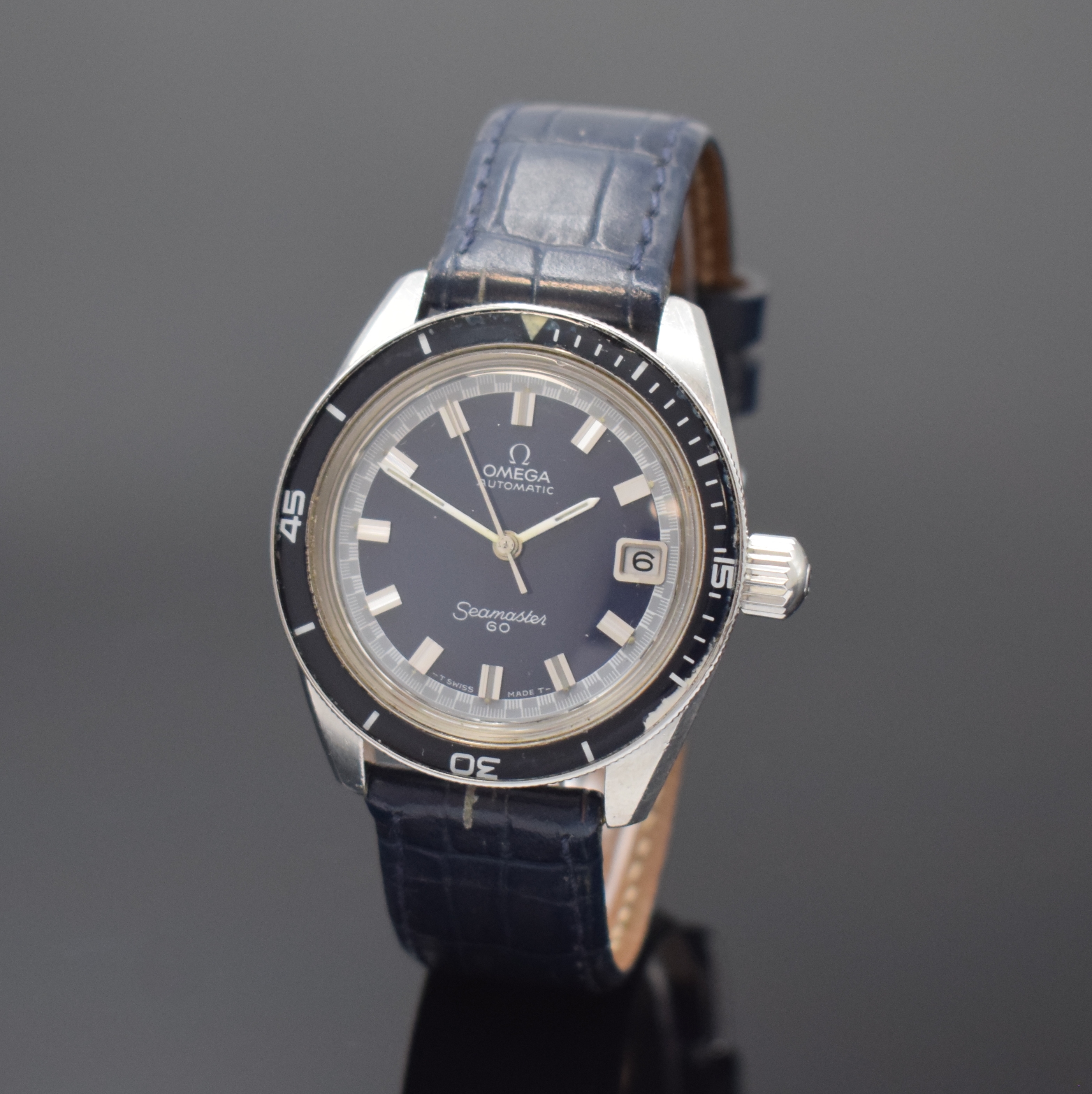 OMEGA Seamaster 60 Herrenarmbanduhr in Stahl Referenz 166.062, Schweiz um 1970, Automatik, unpoliertes Geh., Boden u. Krone verschr., blaue ...