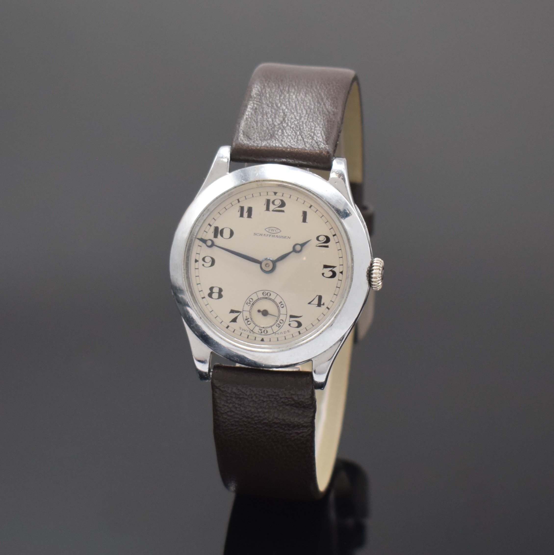 IWC seltene und frühe Armbanduhr Kaliber 76 in Silber, Schweiz um 1928, Handaufzug, Scharniergeh. in Sterlingsilber, verchromt, Lünette aufgedr., ...