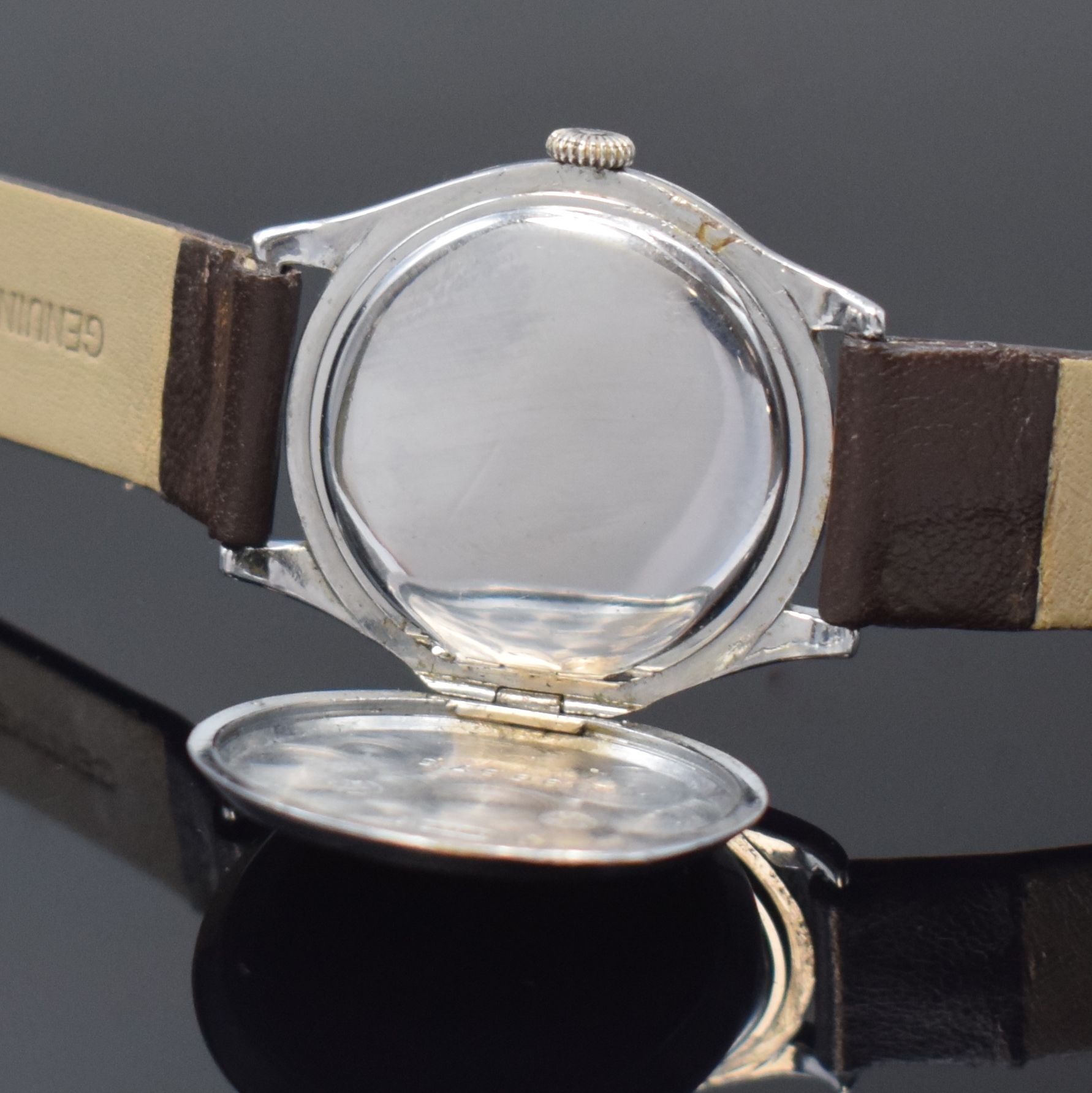 Detail e: IWC seltene und frühe Armbanduhr Kaliber 76 in Silber, Schweiz um 1928, Handaufzug, Scharniergeh. in Sterlingsilber, verchromt, Lünette aufgedr., ...