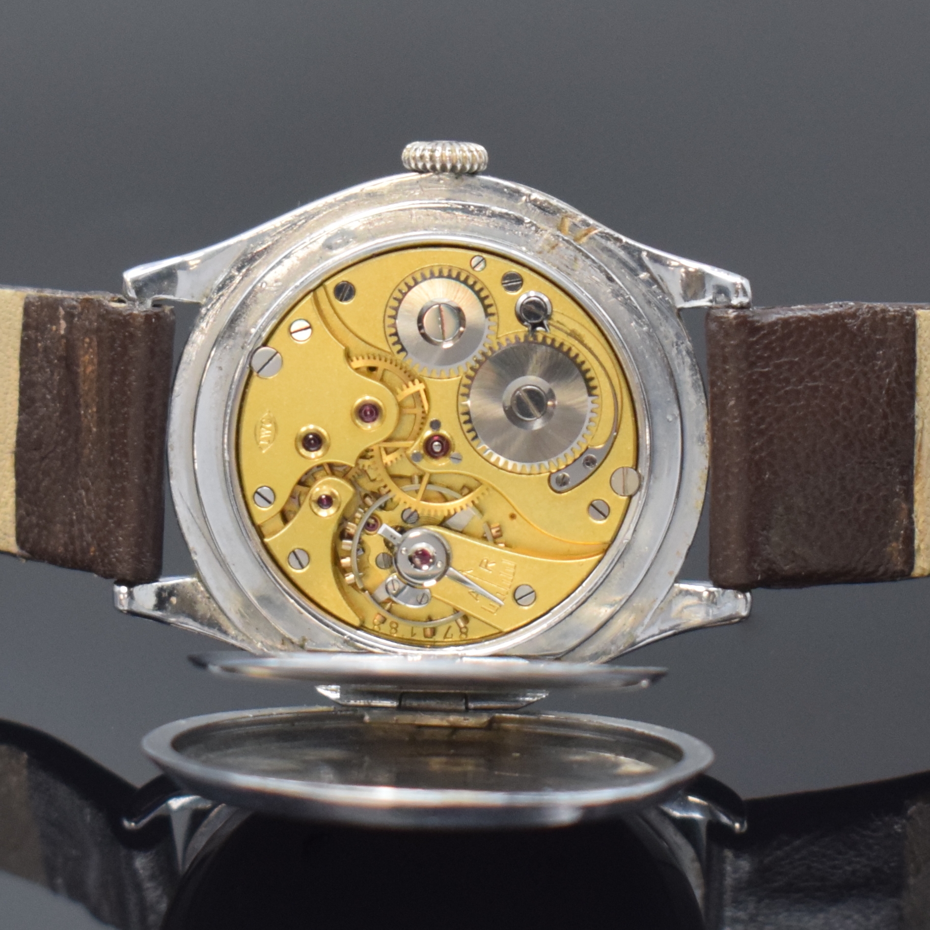 Detail g: IWC seltene und frühe Armbanduhr Kaliber 76 in Silber, Schweiz um 1928, Handaufzug, Scharniergeh. in Sterlingsilber, verchromt, Lünette aufgedr., ...