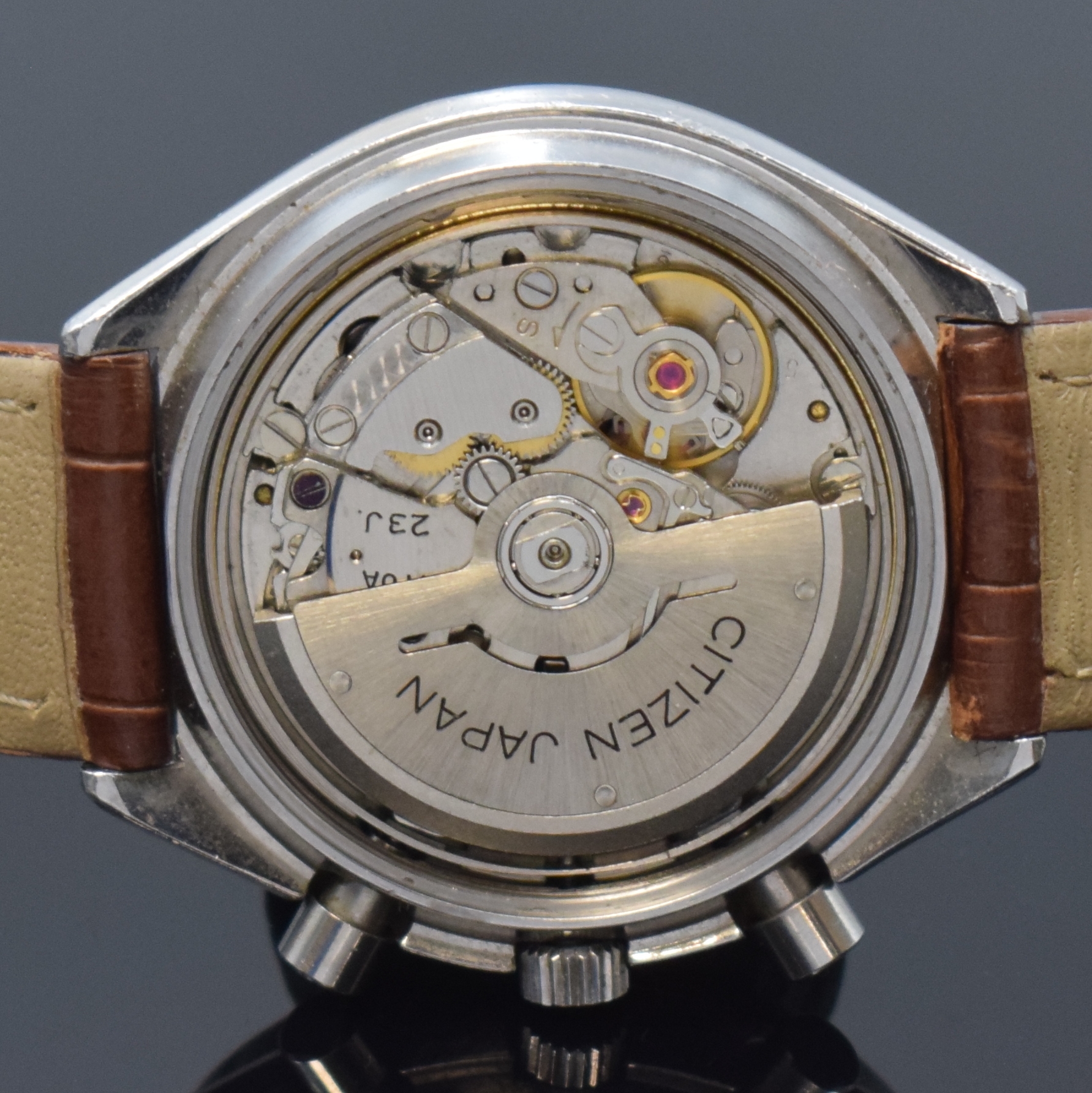 Detail e: CITIZEN Chronograph Automatik Herrenarmbanduhr in Stahl, Japan um 1975, verschr. Geh. Ref. 67-9313, schwarz. Tachymeter-Lunette, schwarz. Zifferbl., ...