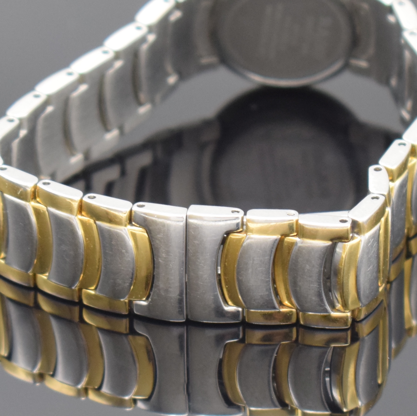 Detail d: RADO Diastar Damenarmbanduhr Referenz 318.0550.3, Schweiz um 1995, quarz, Gliederband m. dopp. Faltschl., Boden aufgedr., silb. Zifferbl. m. gold. ...