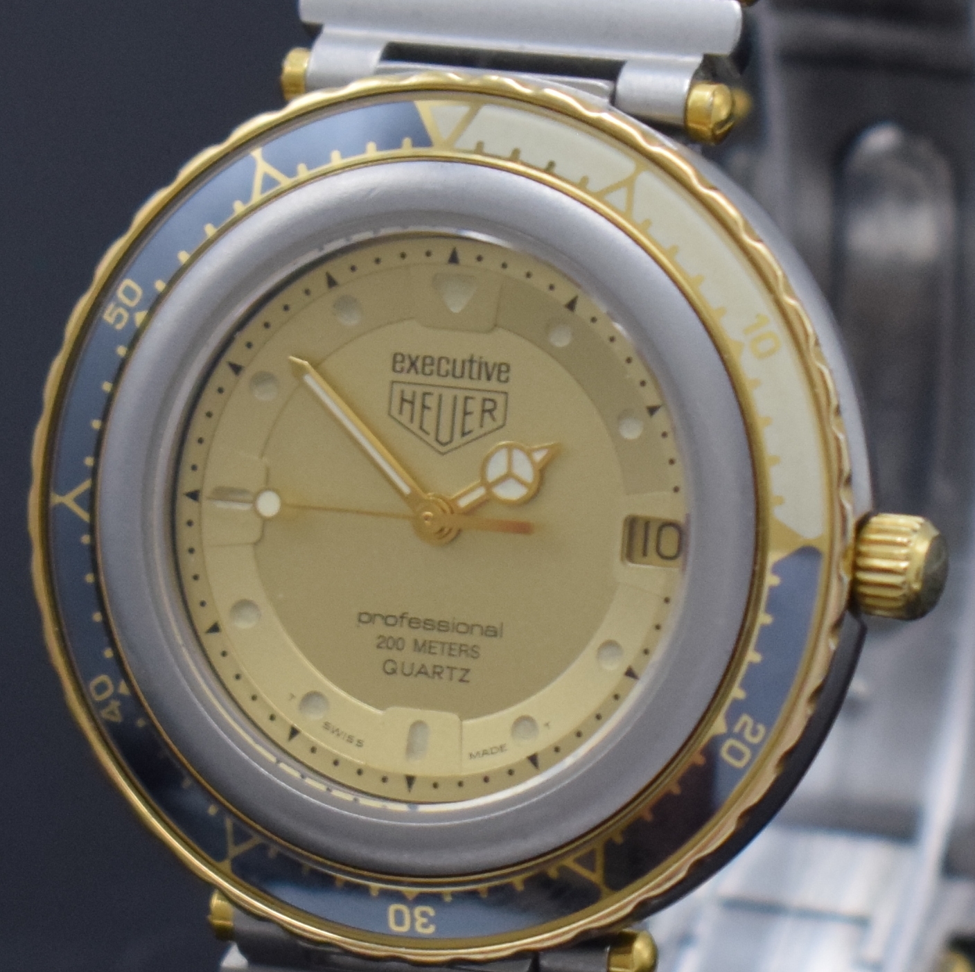 Detail a: HEUER professional Executive Armbanduhr Referenz 915.413, Schweiz um 1985, quarz, Edelstahlgeh. inkl. orig. Gliederband m. Faltschl., Boden u. Krone ...