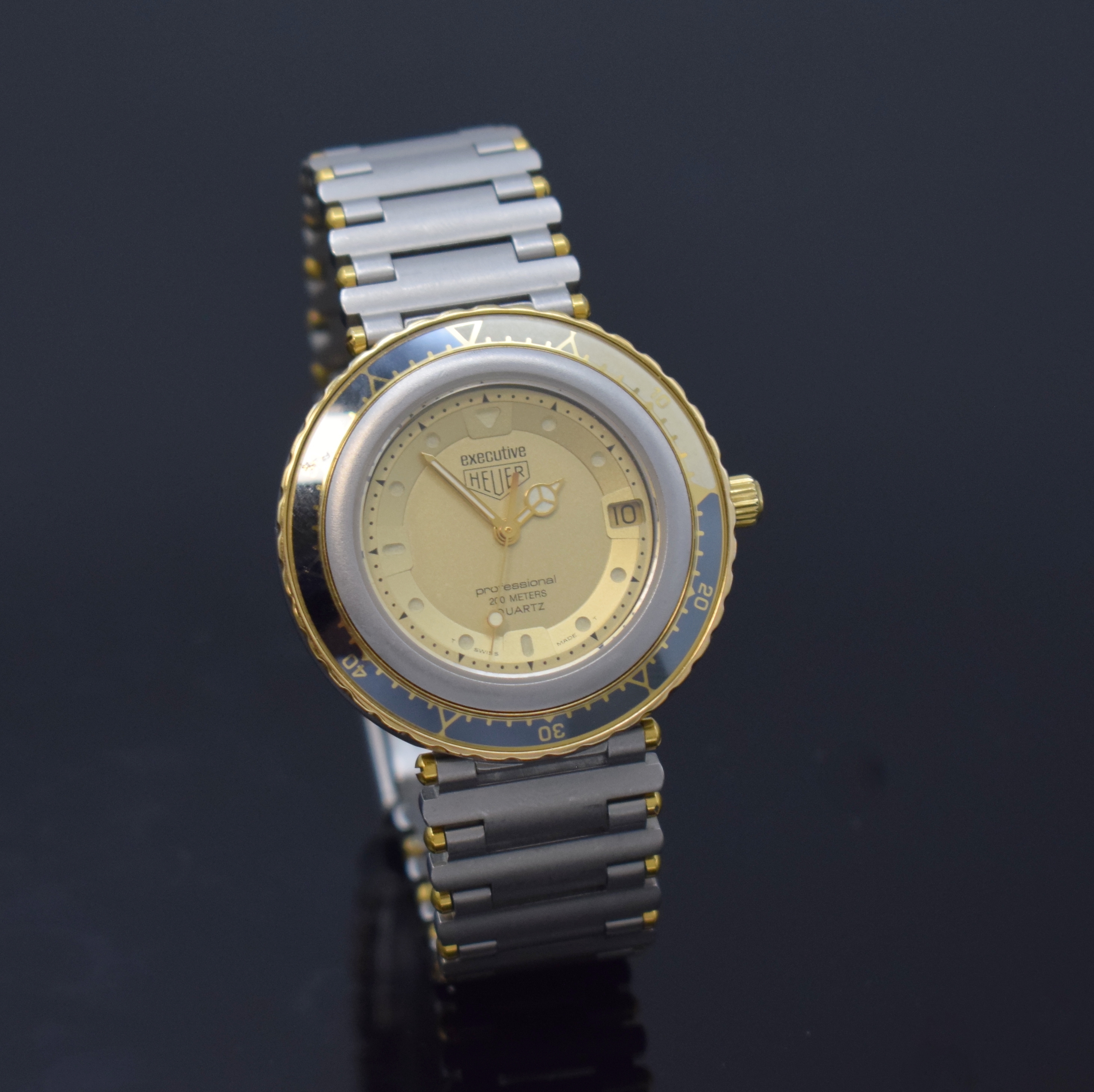 Detail b: HEUER professional Executive Armbanduhr Referenz 915.413, Schweiz um 1985, quarz, Edelstahlgeh. inkl. orig. Gliederband m. Faltschl., Boden u. Krone ...